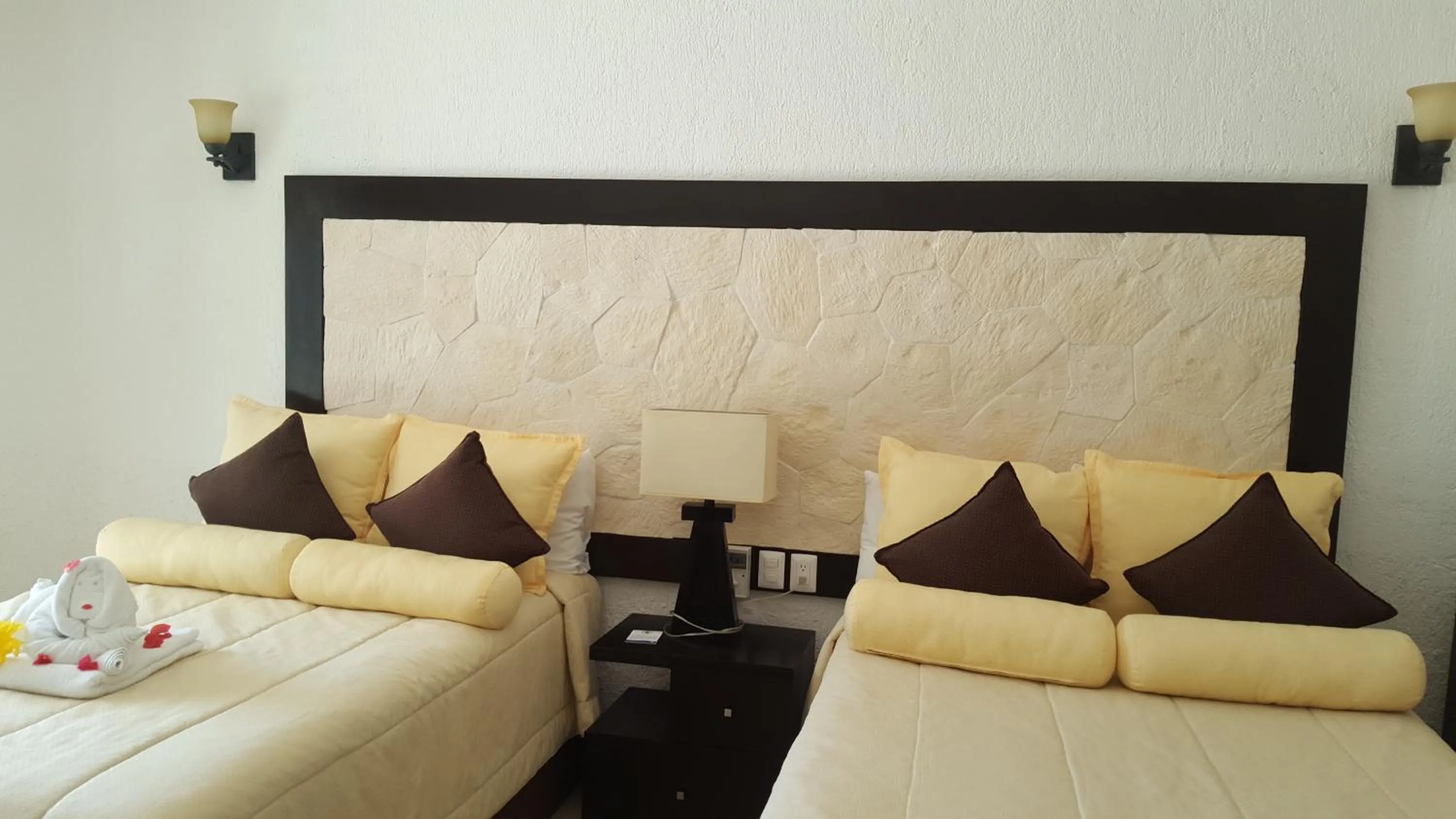 Bed in Hotel Club Akumal Caribe