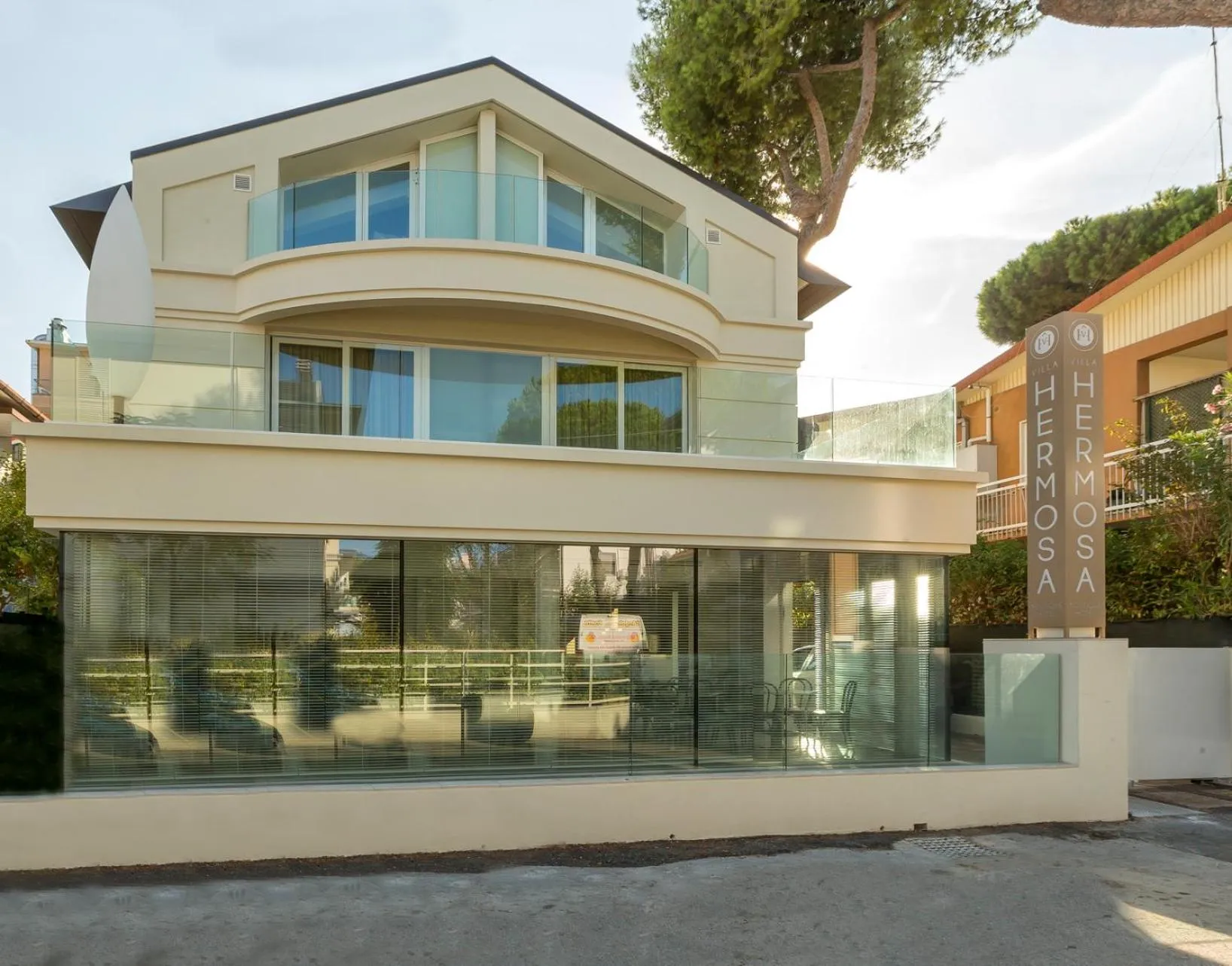 Property logo or sign in Hotel Villa Hermosa