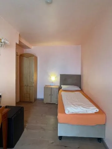 Bed in Hotel Am Roonplatz