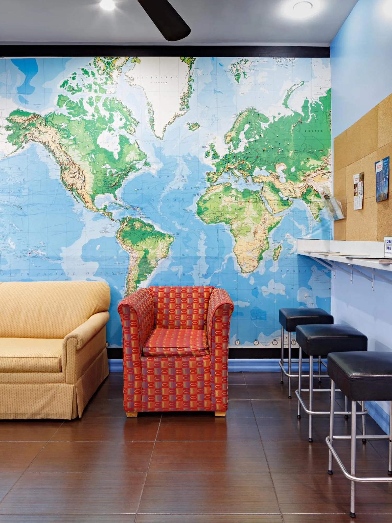 Communal lounge/ TV room in Central Park West Hostel