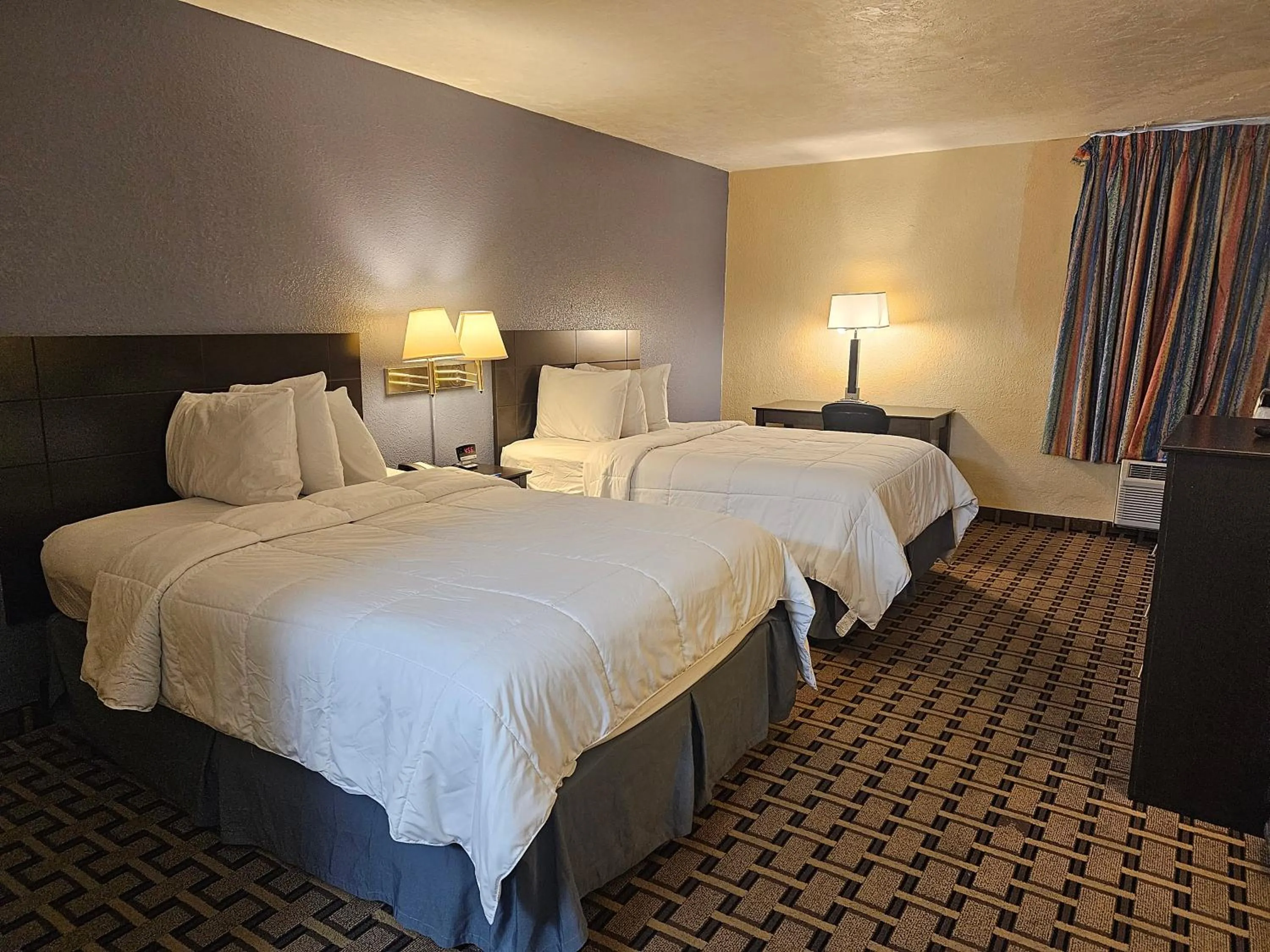 Bed in Travelodge by Wyndham Fort Myers