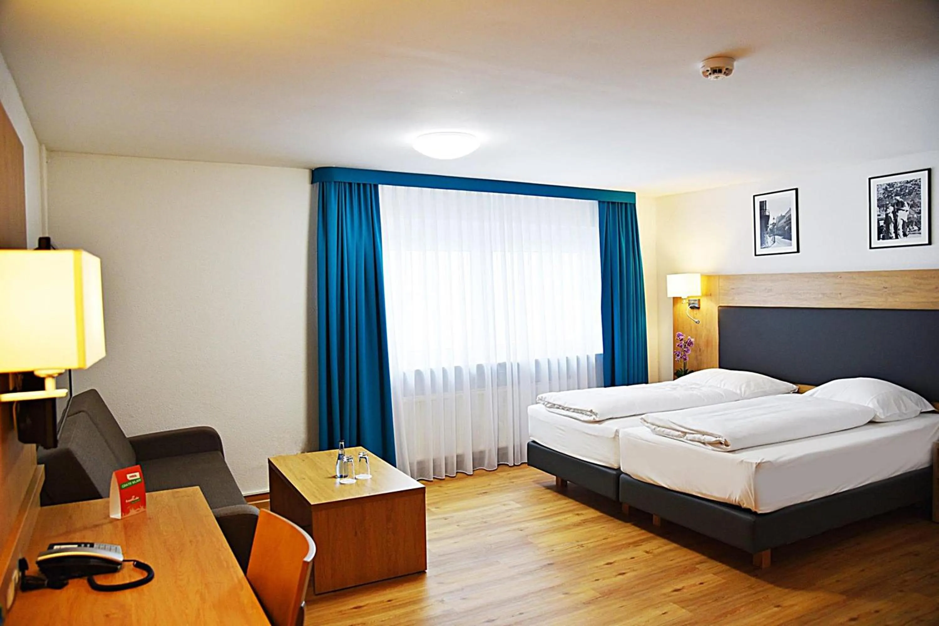 Photo of the whole room, Bed in Garni-Hotel zur Krone