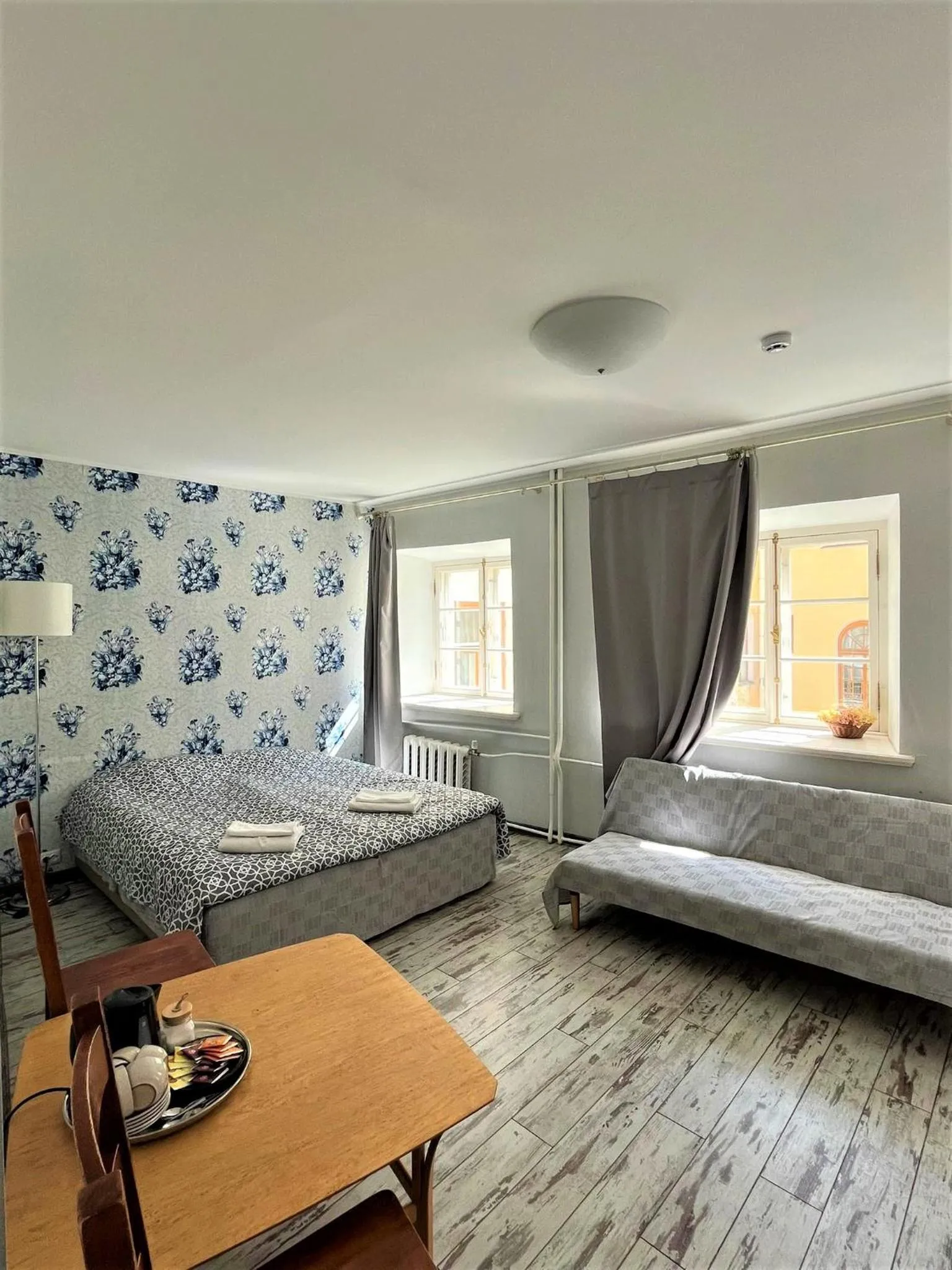 Bed in Godart Rooms Guesthouse