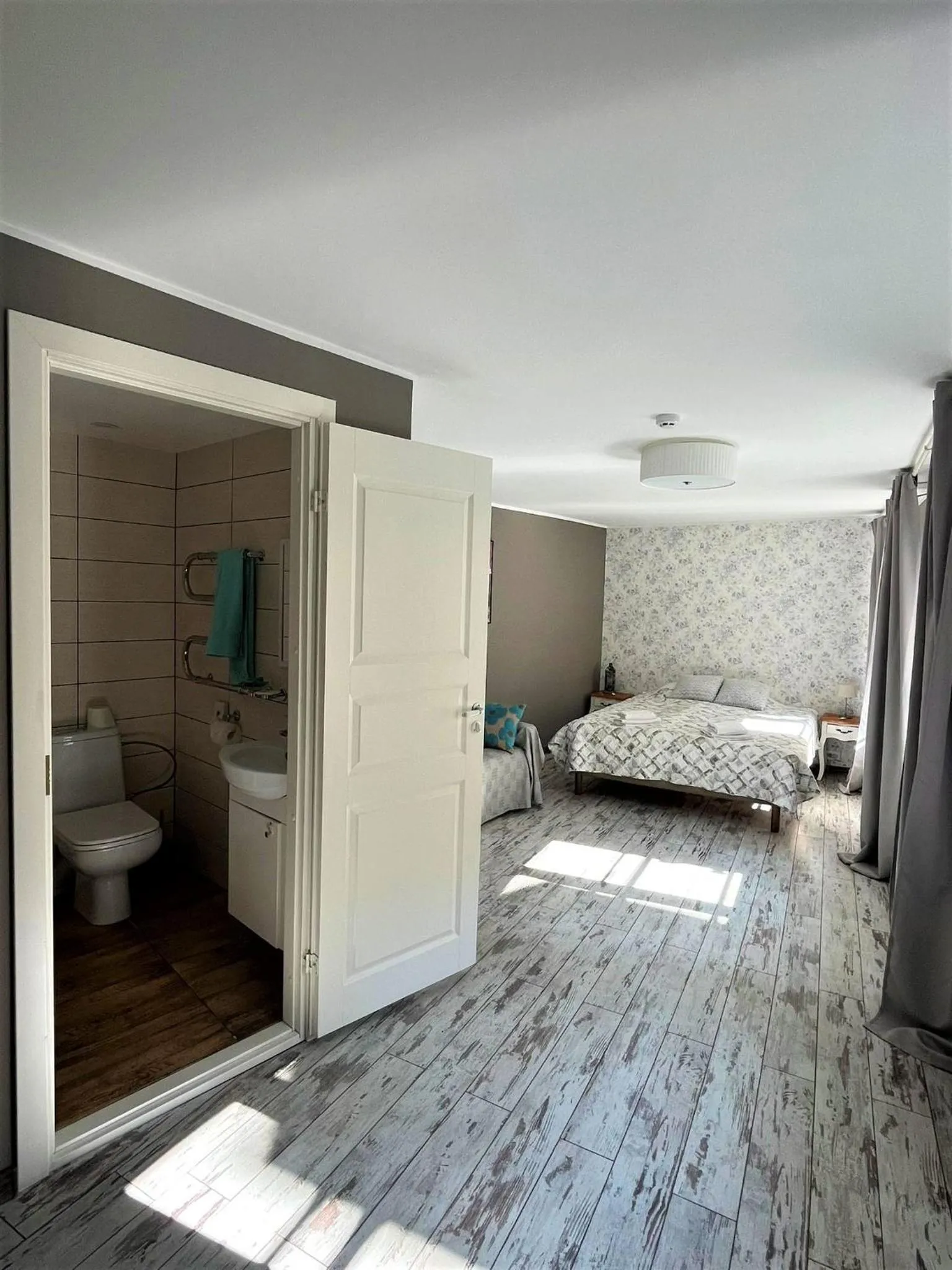 Bed in Godart Rooms Guesthouse