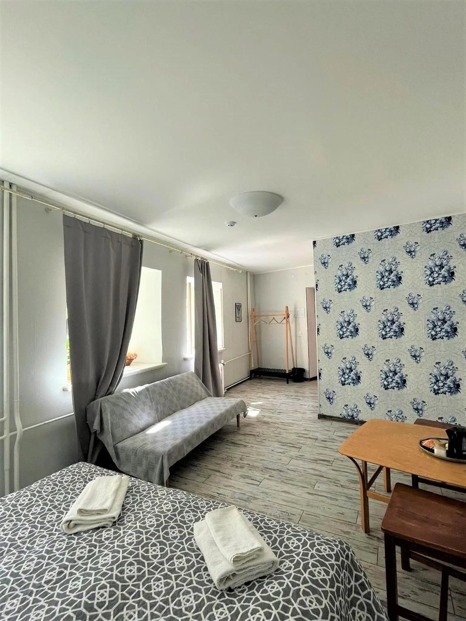 Bed in Godart Rooms Guesthouse