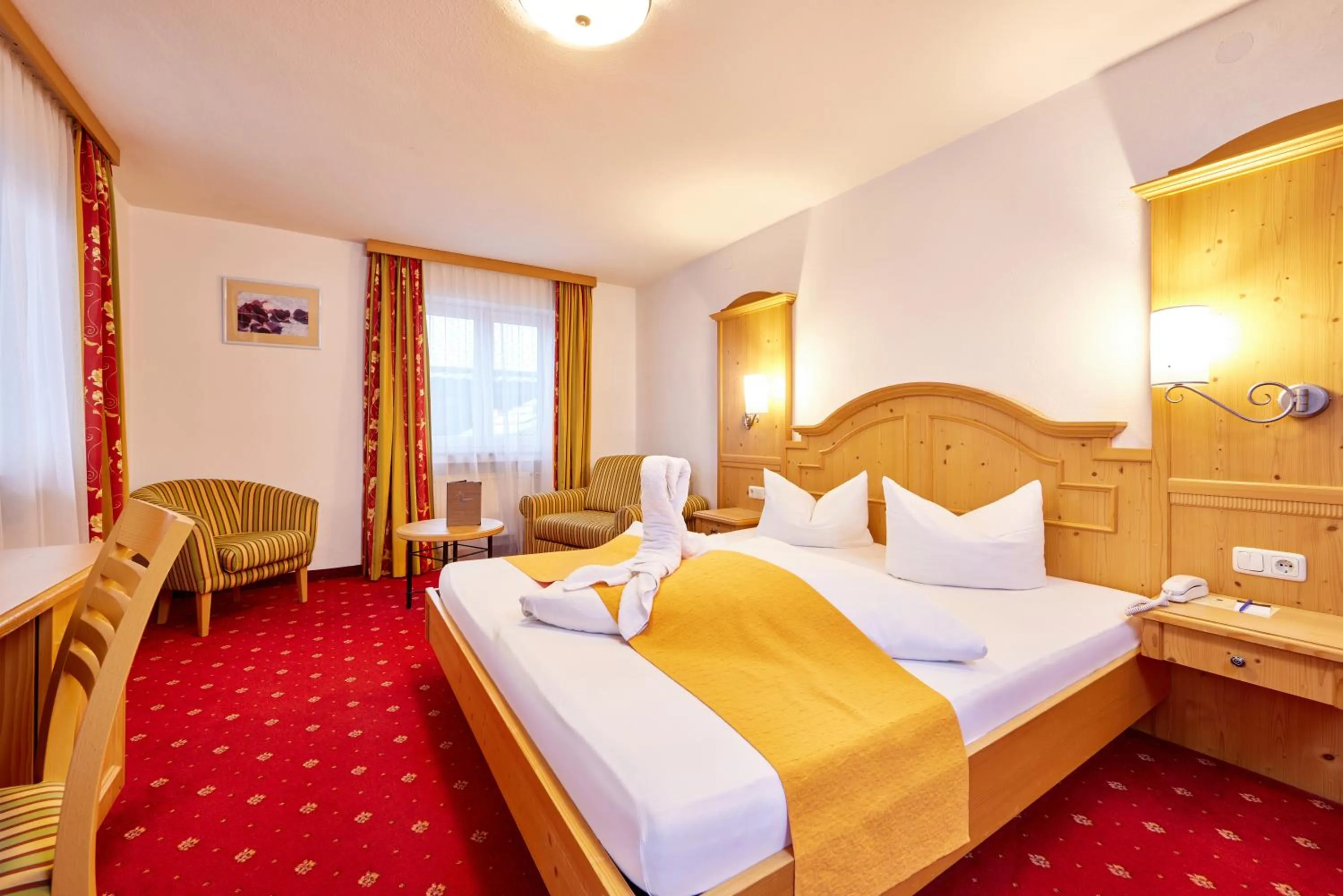 Bed in Alpenhotel Rieger