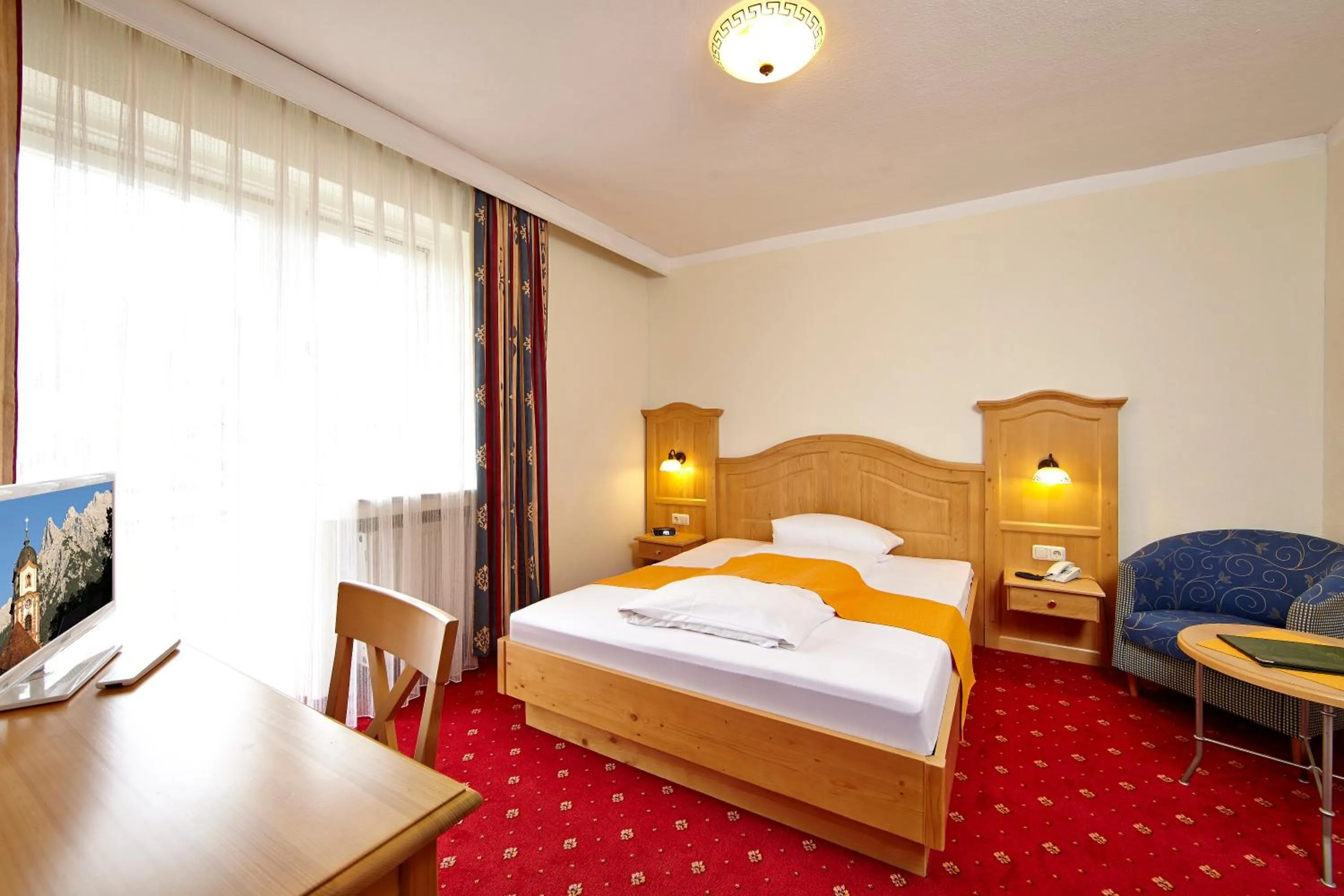 Photo of the whole room, Bed in Alpenhotel Rieger