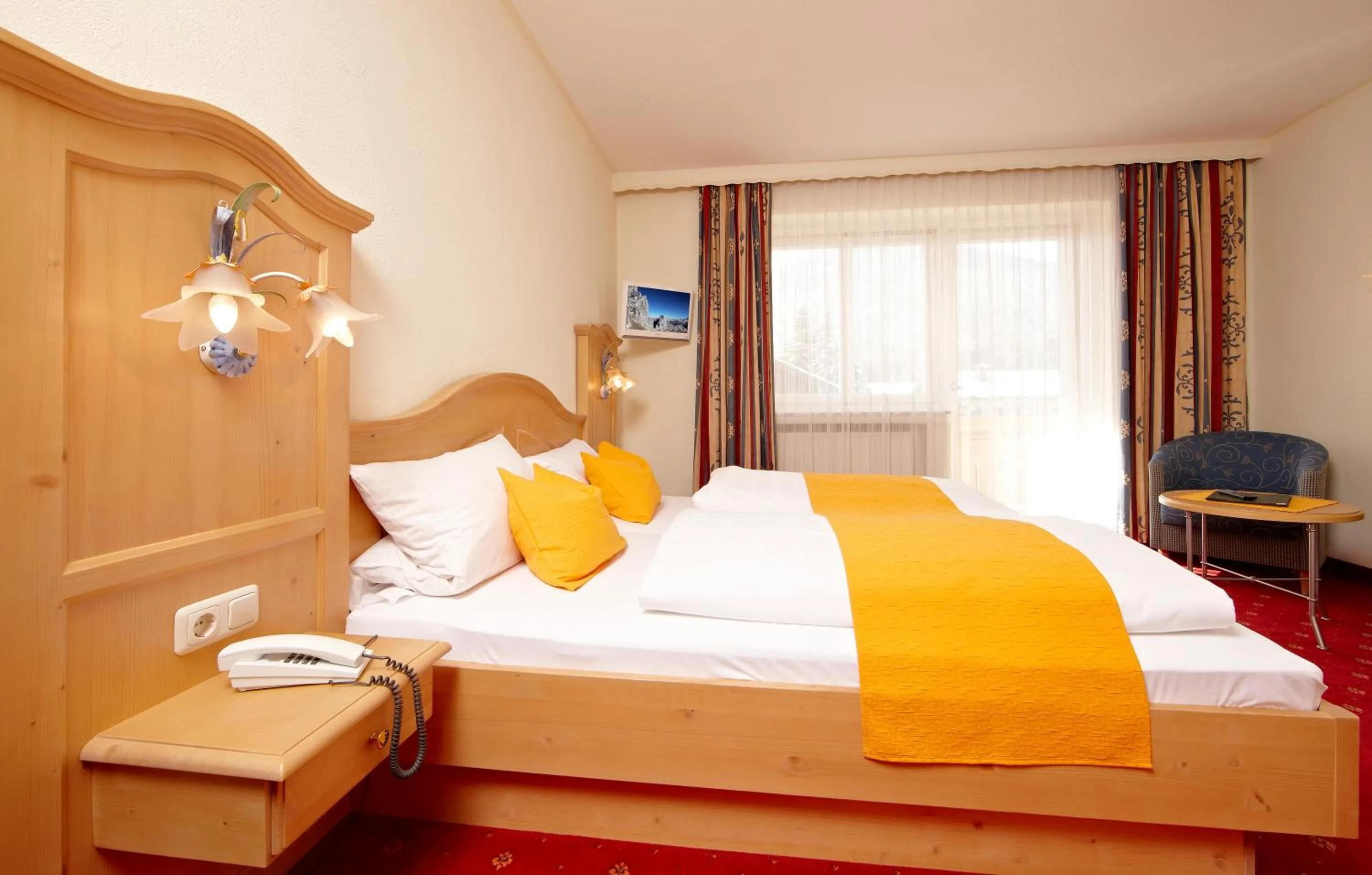 Photo of the whole room, Bed in Alpenhotel Rieger