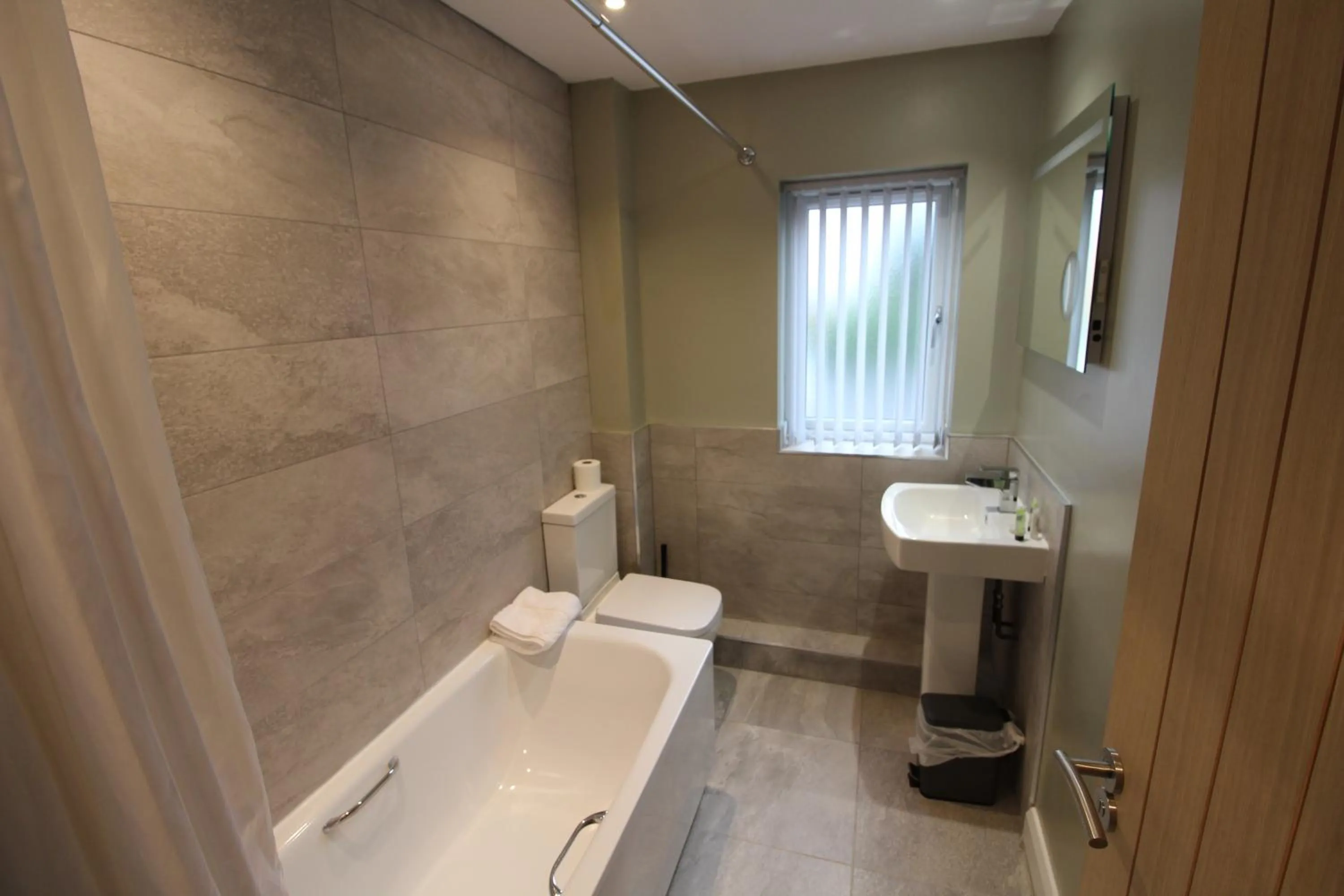 Shower in Plawsworth Hall Serviced Cottages and Apartments