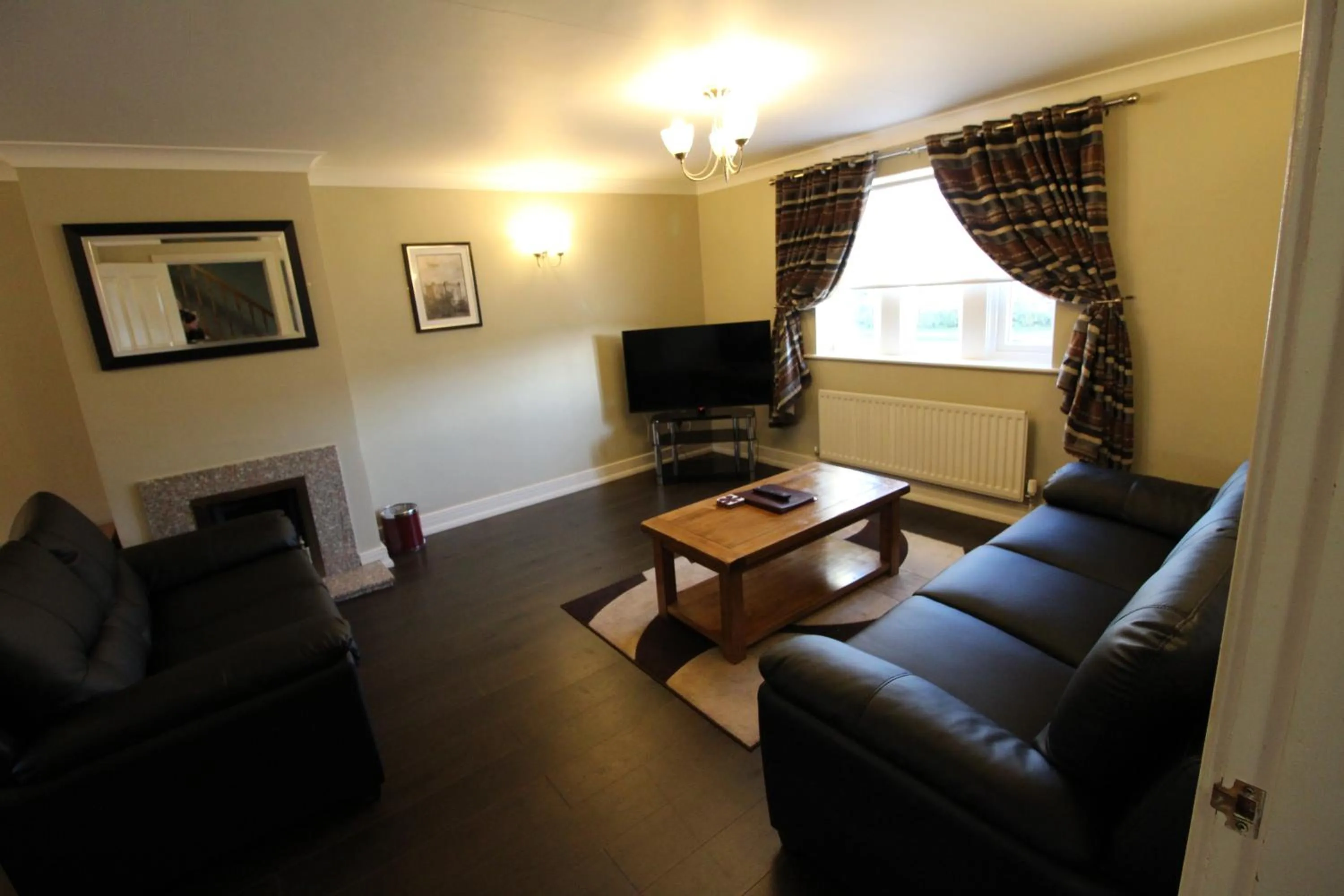 Living room in Plawsworth Hall Serviced Cottages and Apartments