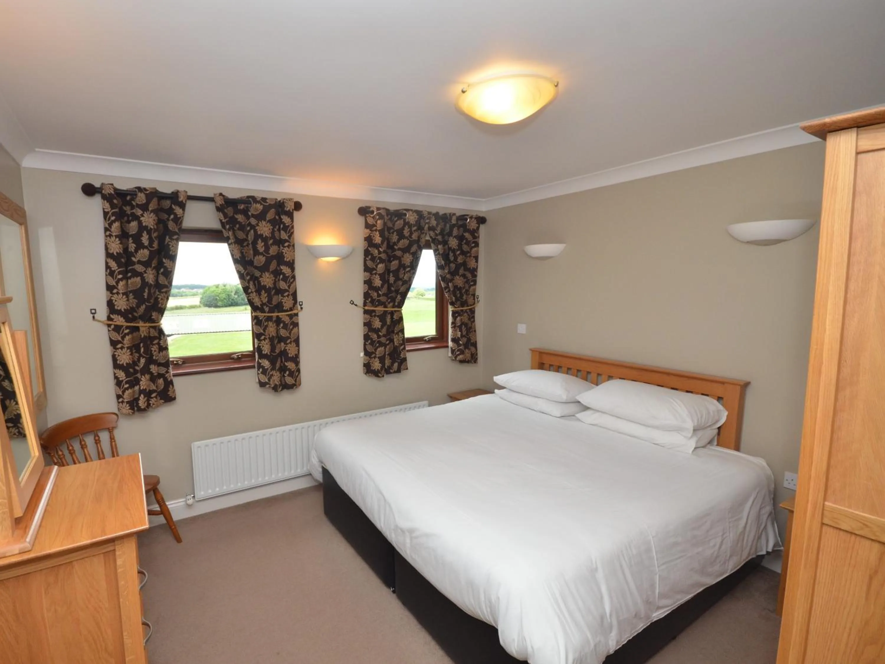 Bedroom, Bed in Plawsworth Hall Serviced Cottages and Apartments