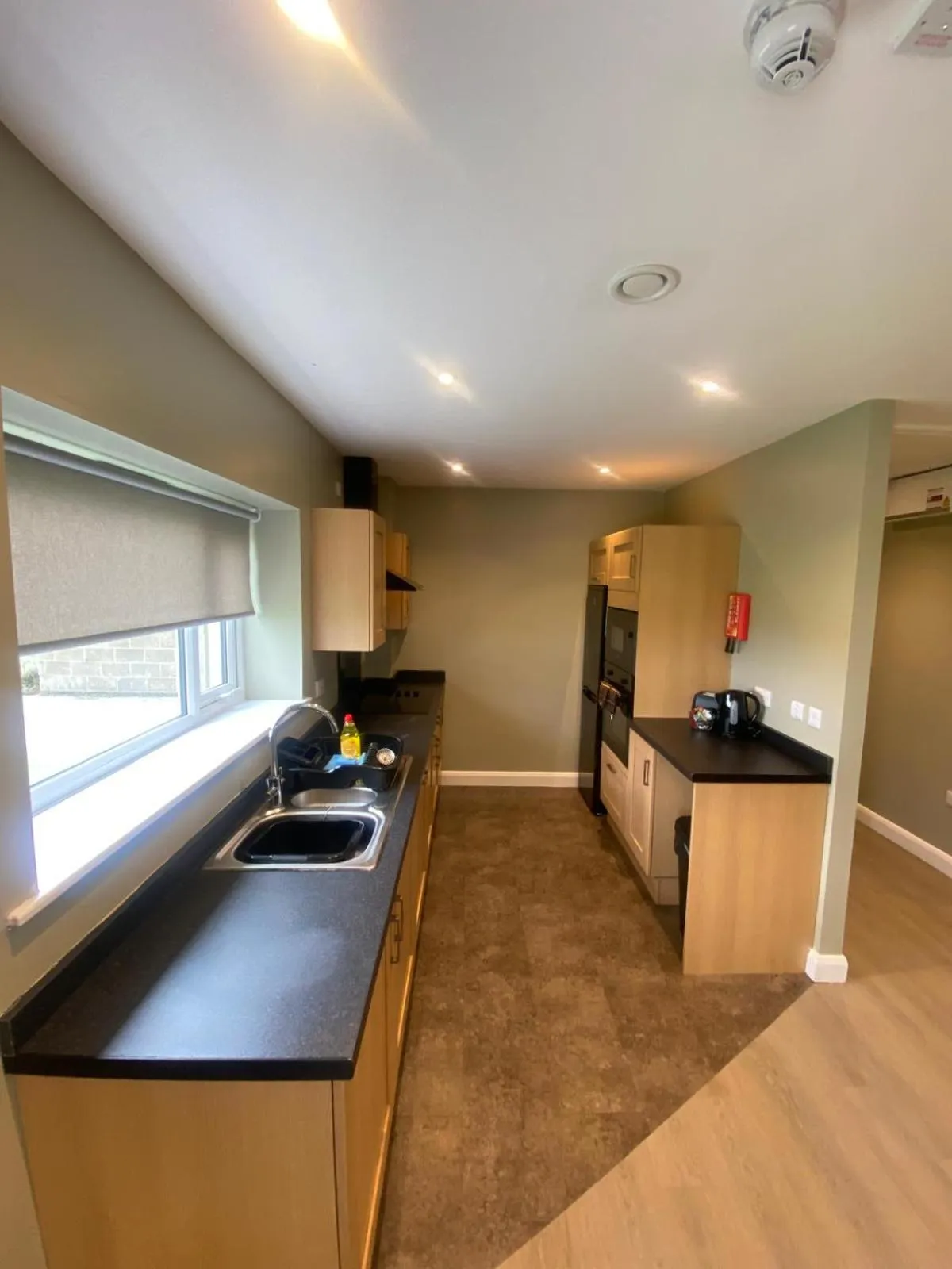 Kitchen or kitchenette in Plawsworth Hall Serviced Cottages and Apartments