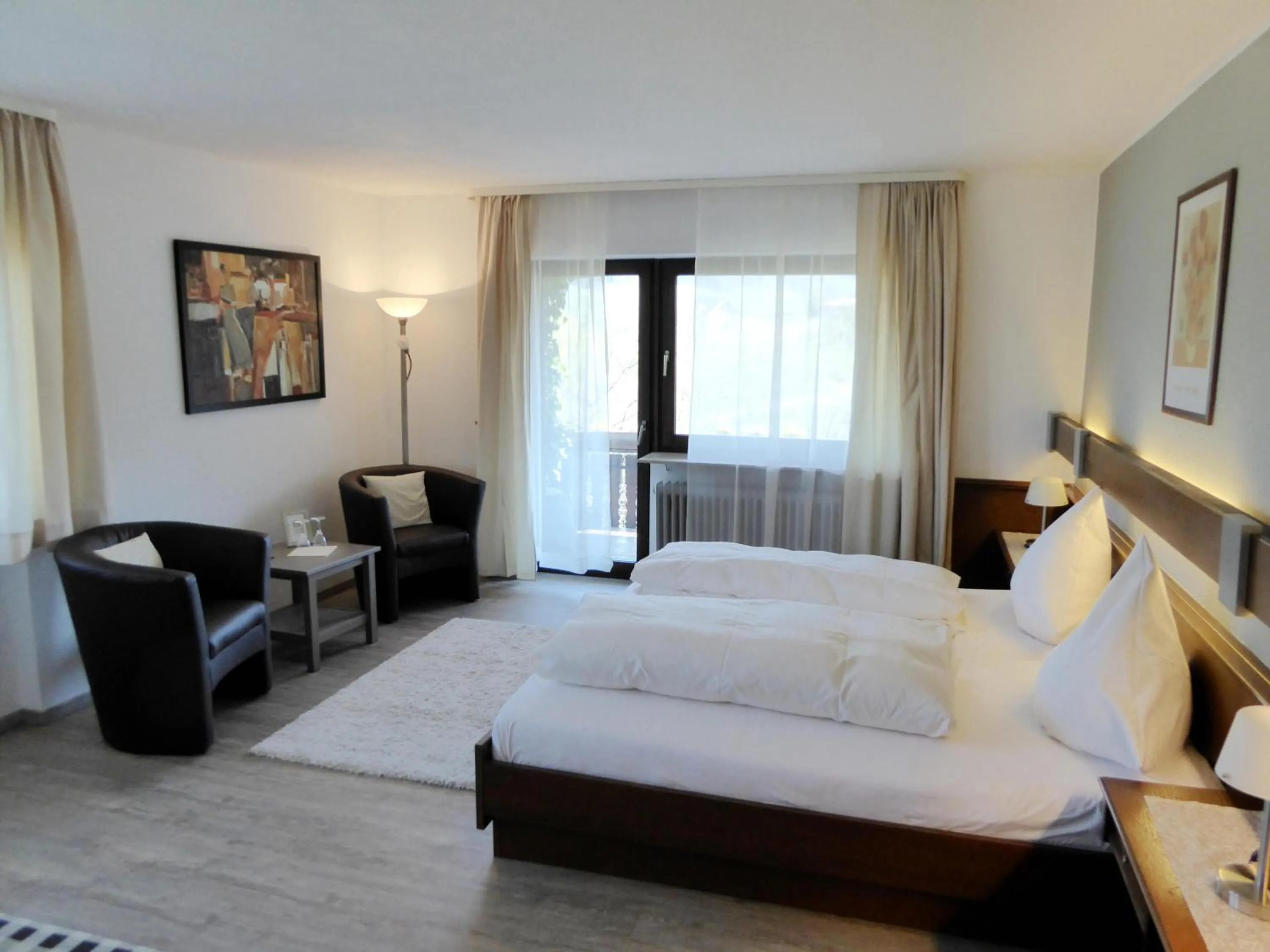 Photo of the whole room, Bed in Landhotel Rebstock