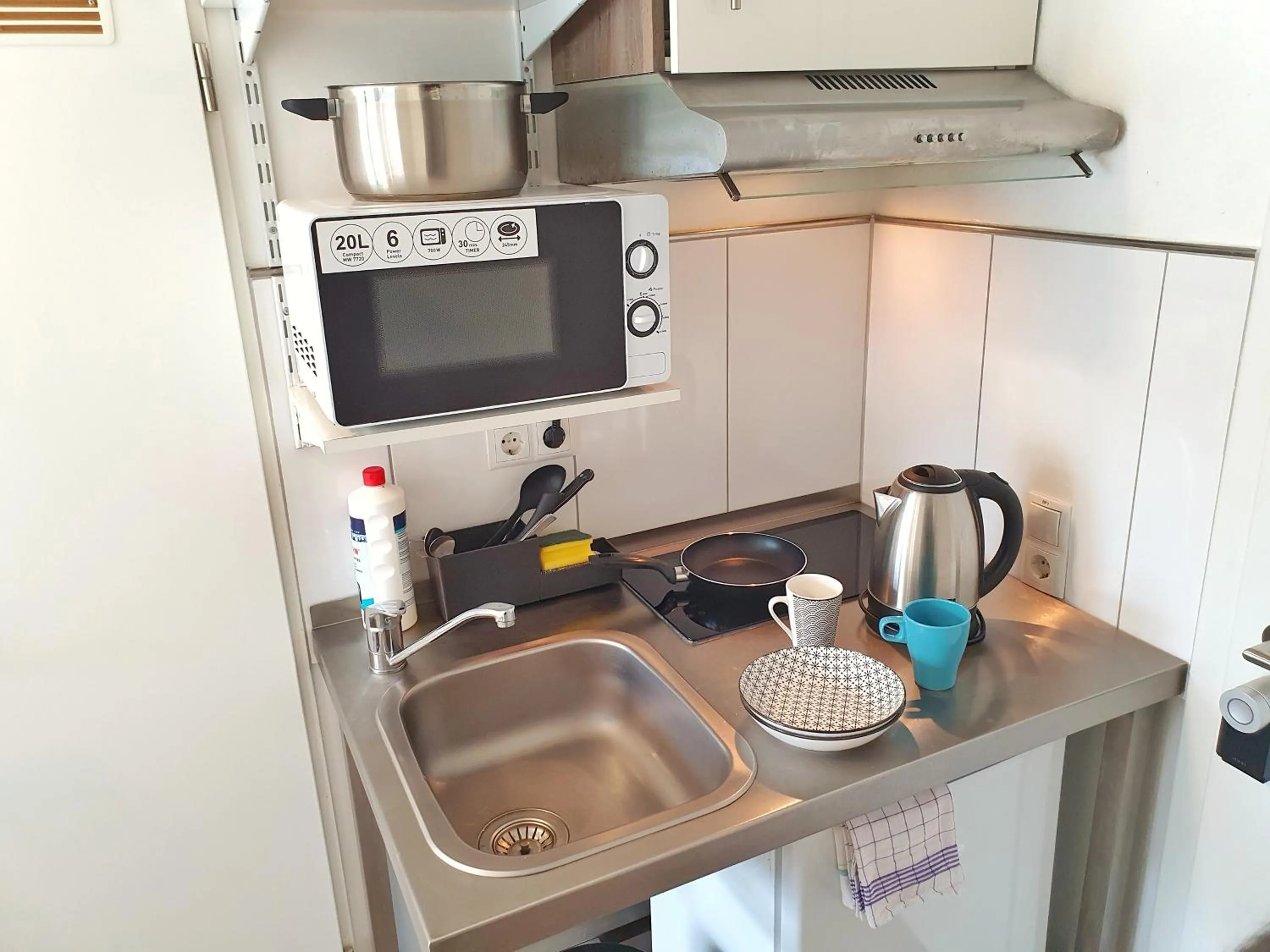 Kitchen or kitchenette in Aparthotel Jonas