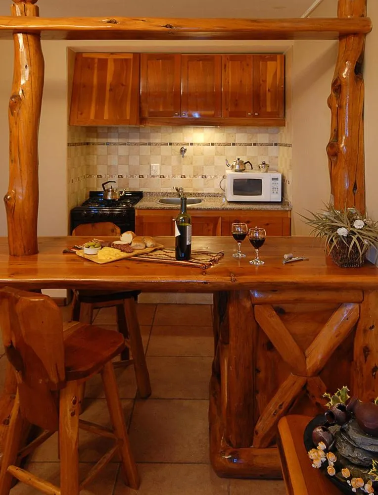 Kitchen or kitchenette in Apart Altos Del Nahuel