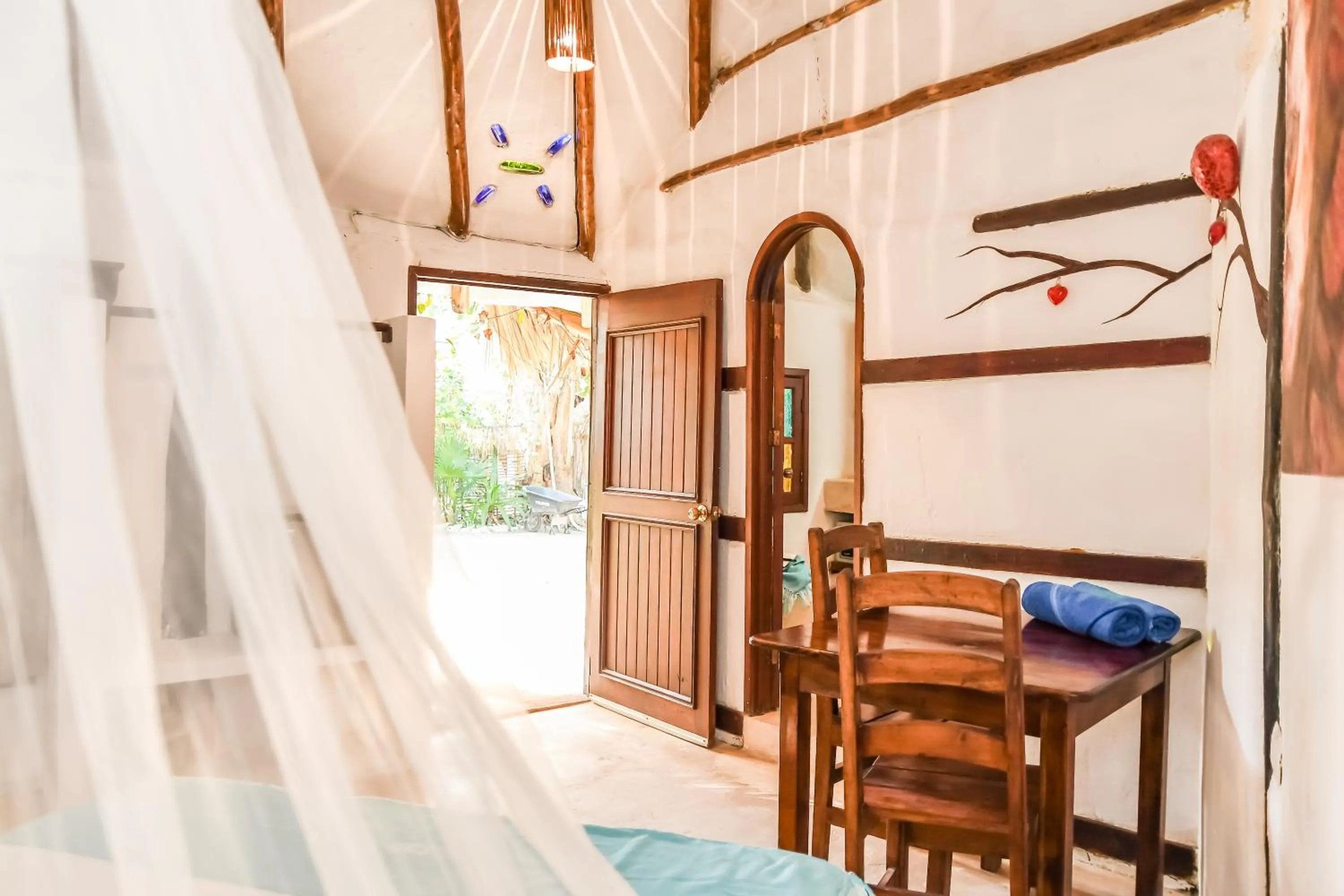 Dining area, Bed in Zomay Beachfront Holbox