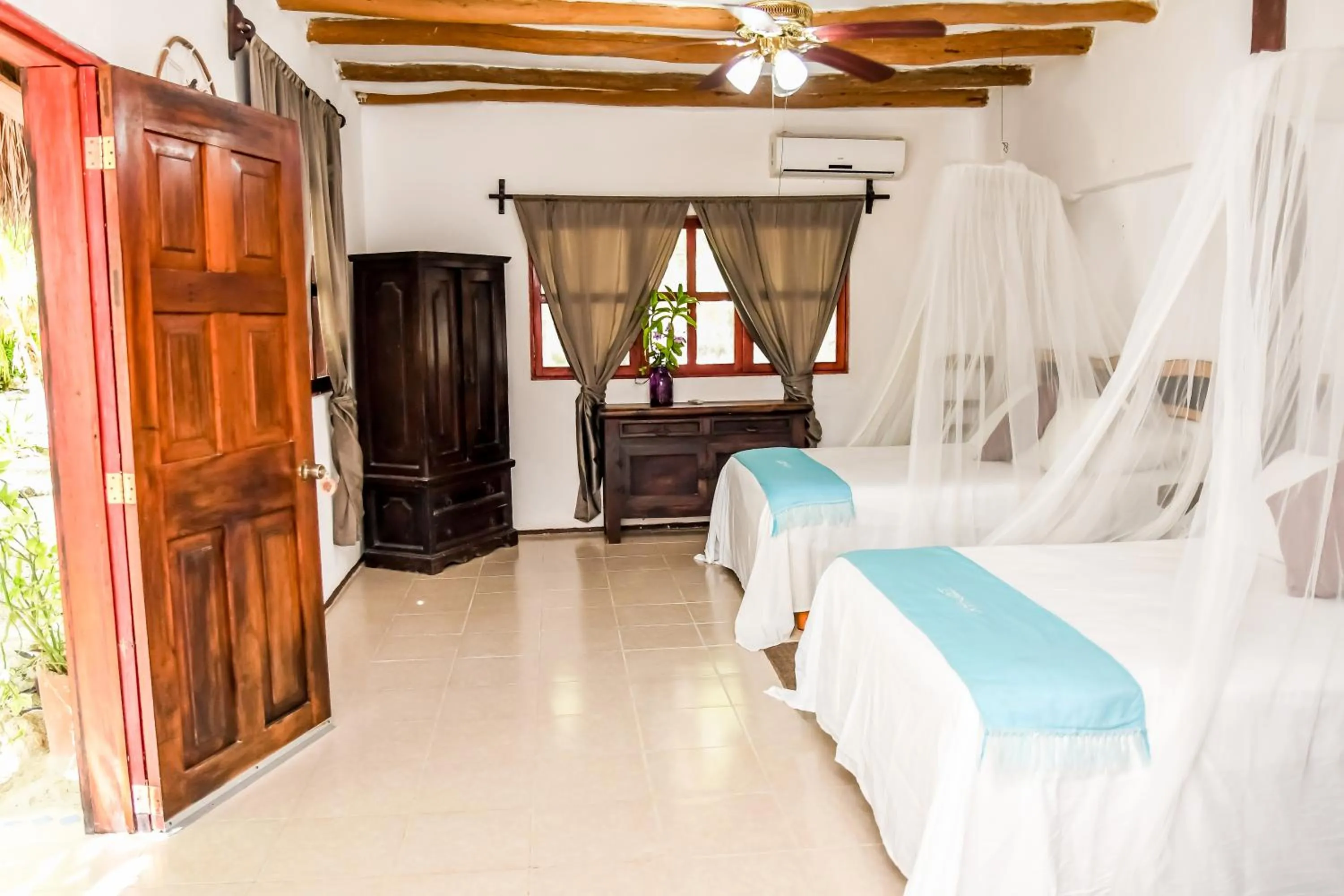 Photo of the whole room, Bed in Zomay Beachfront Holbox