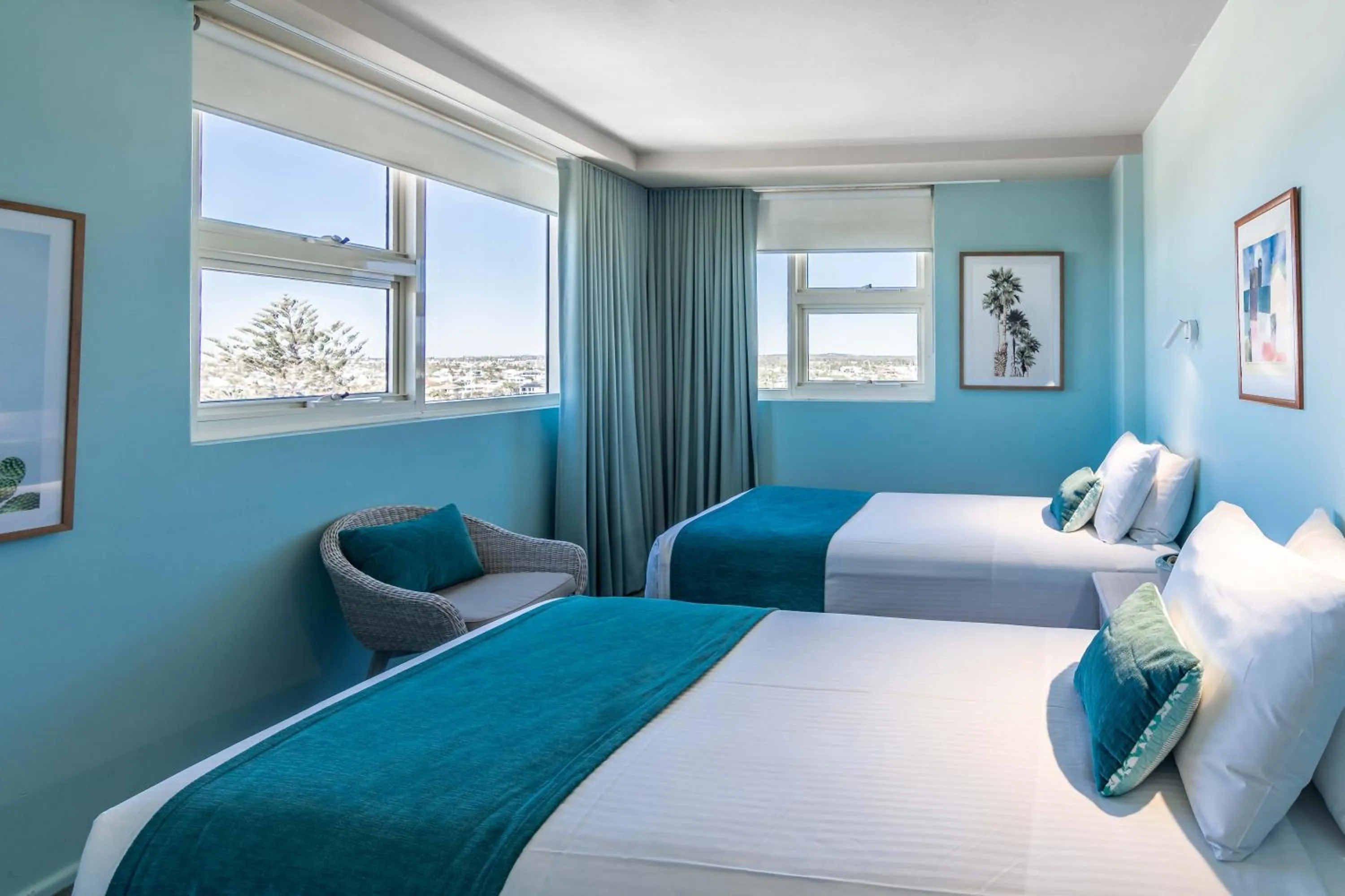 Bed in 84 The Spit Holiday Apartments