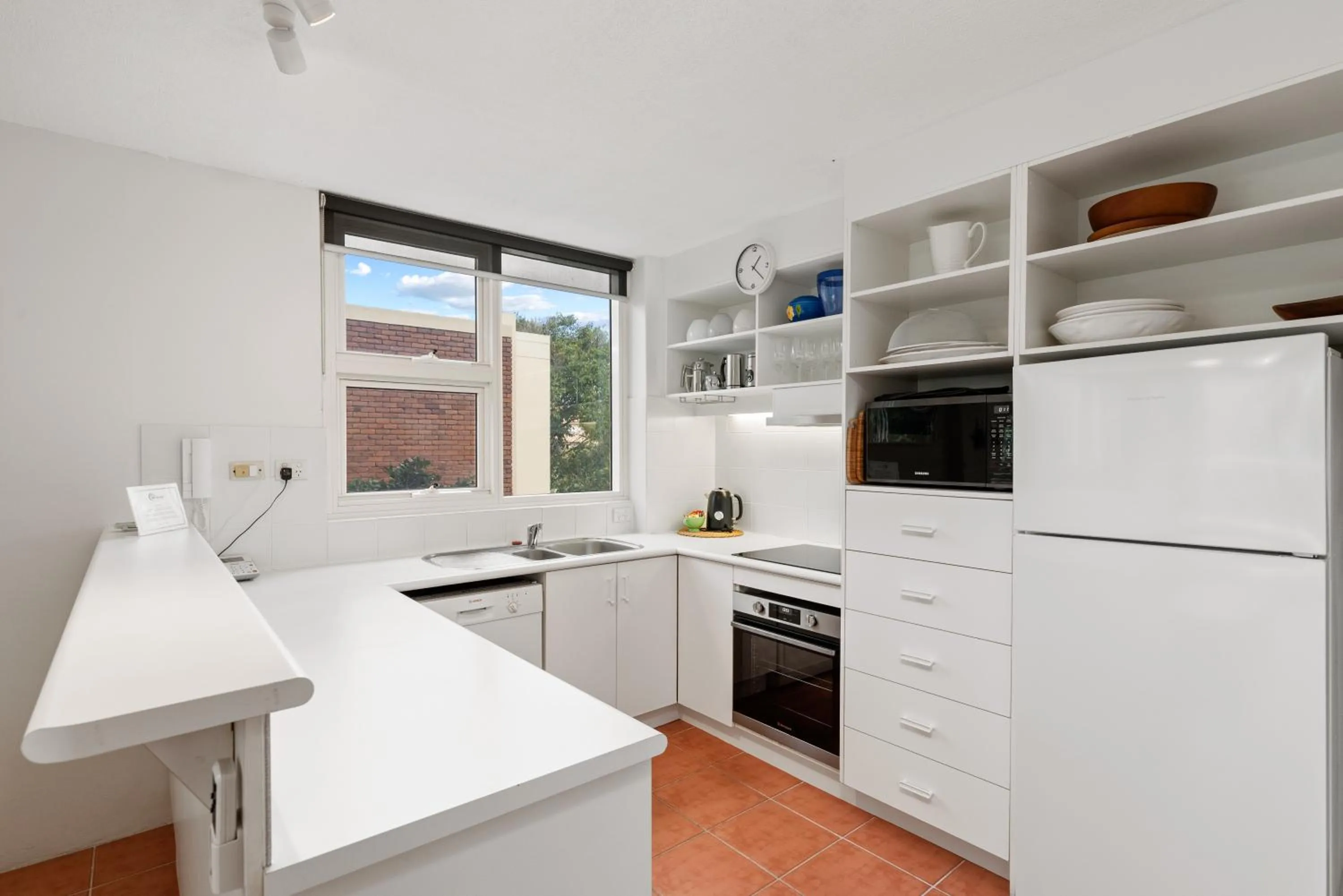 Kitchen or kitchenette in 84 The Spit Holiday Apartments