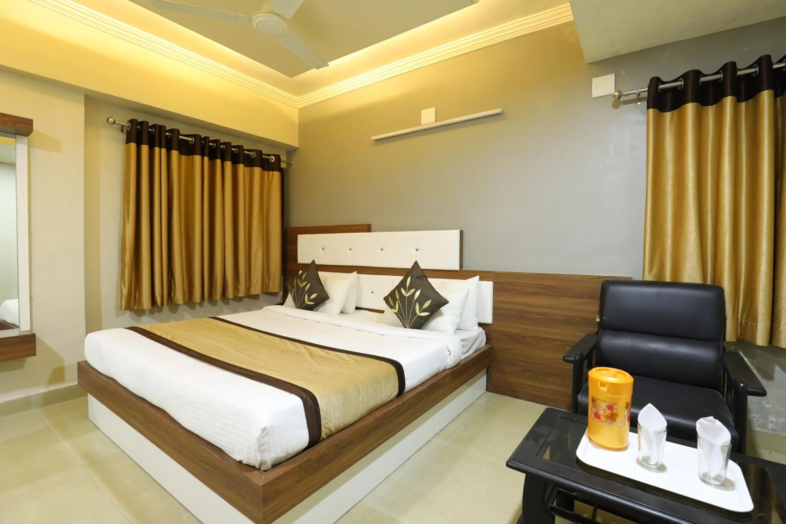Bed in Hotel Loyal Residency
