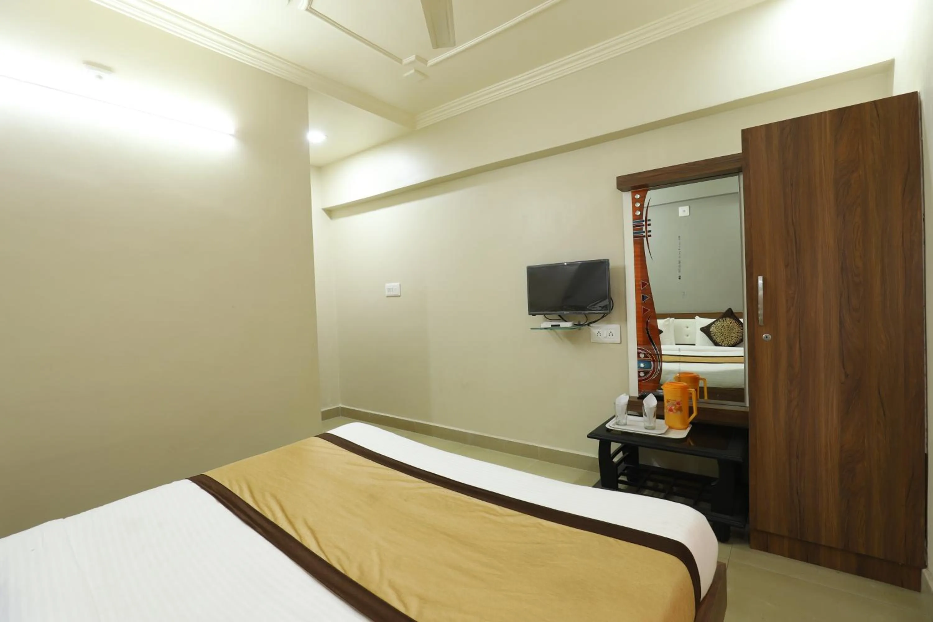 Bed in Hotel Loyal Residency