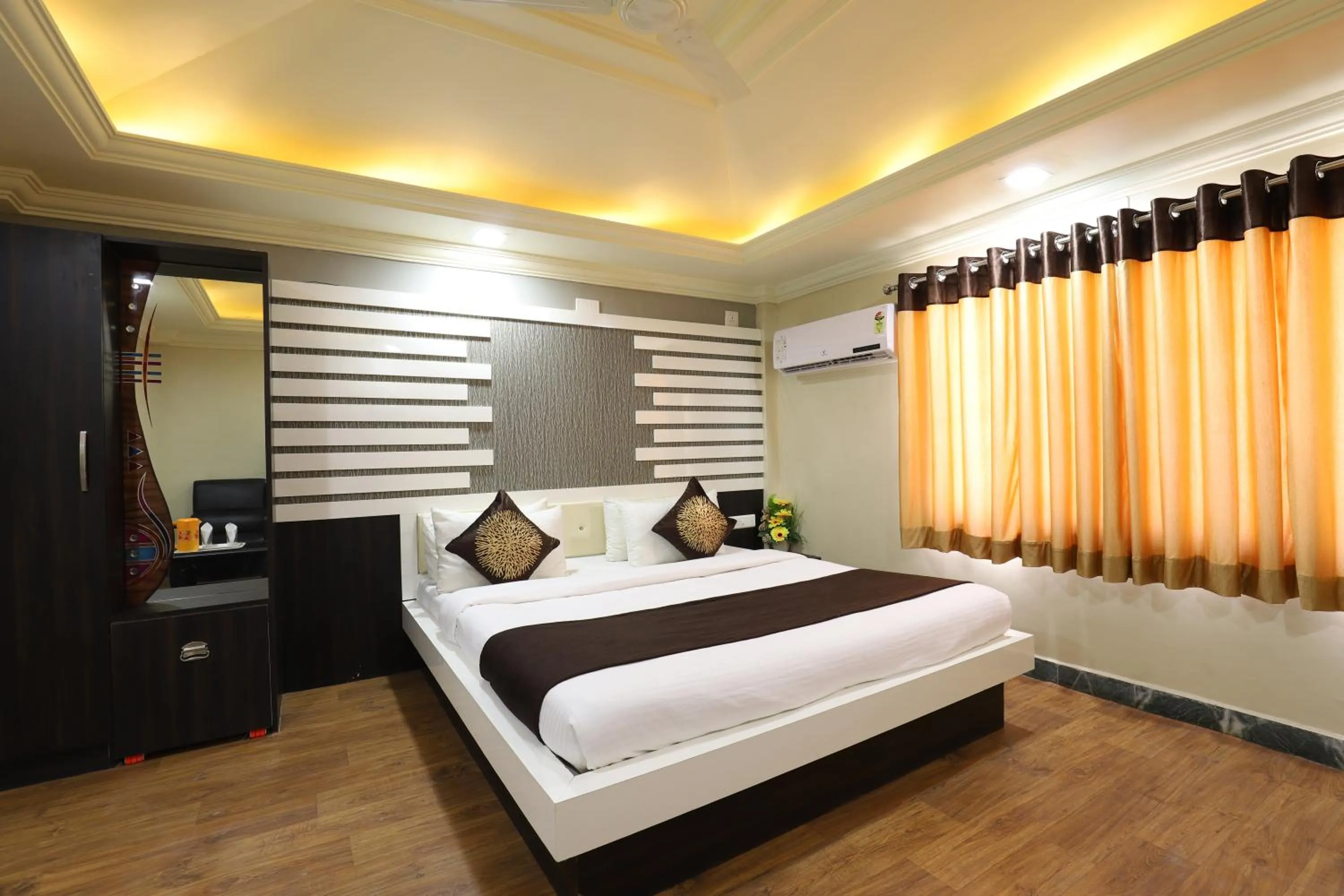 Bed in Hotel Loyal Residency