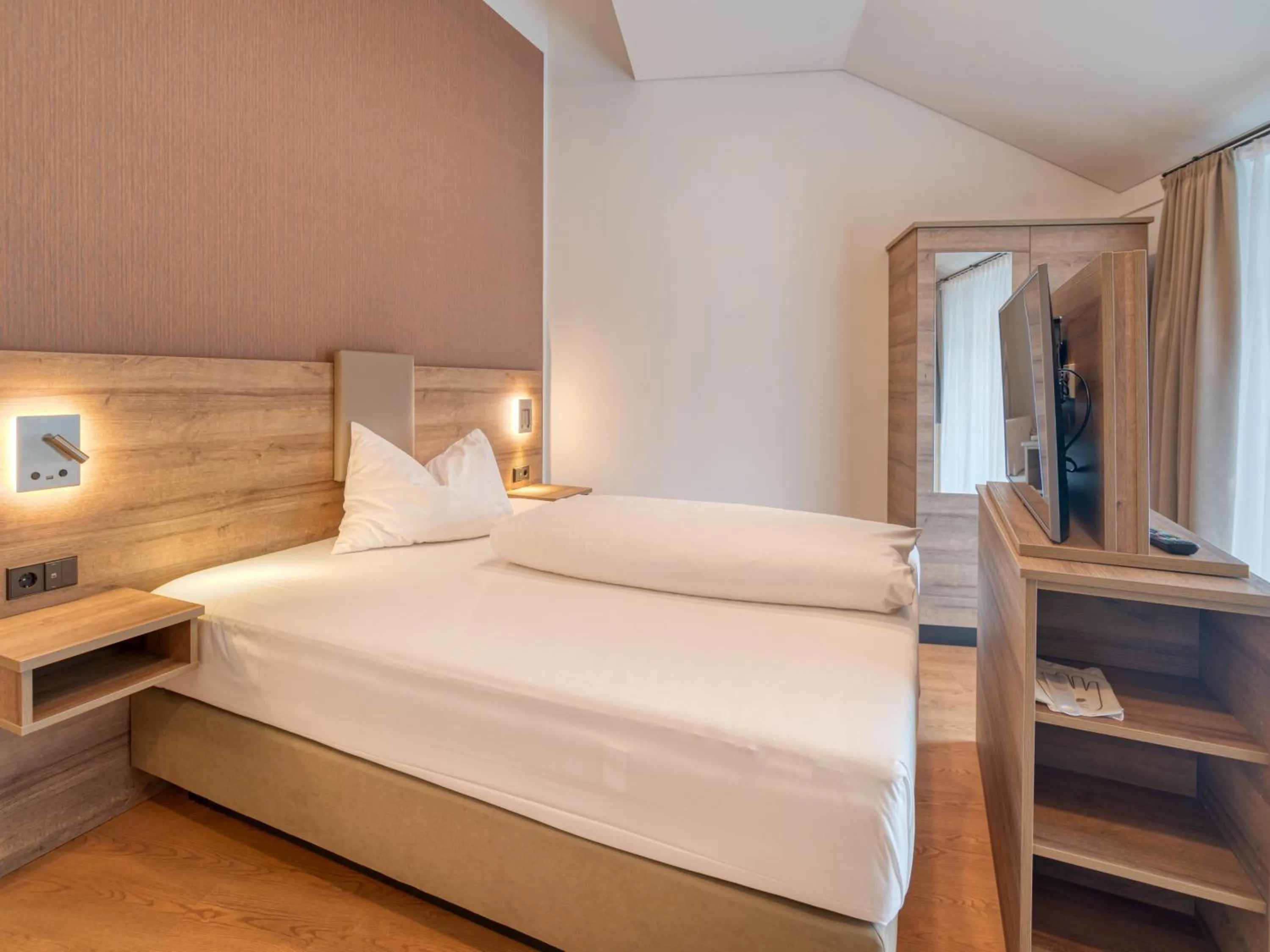 Bed in WESTSIDE Hotel