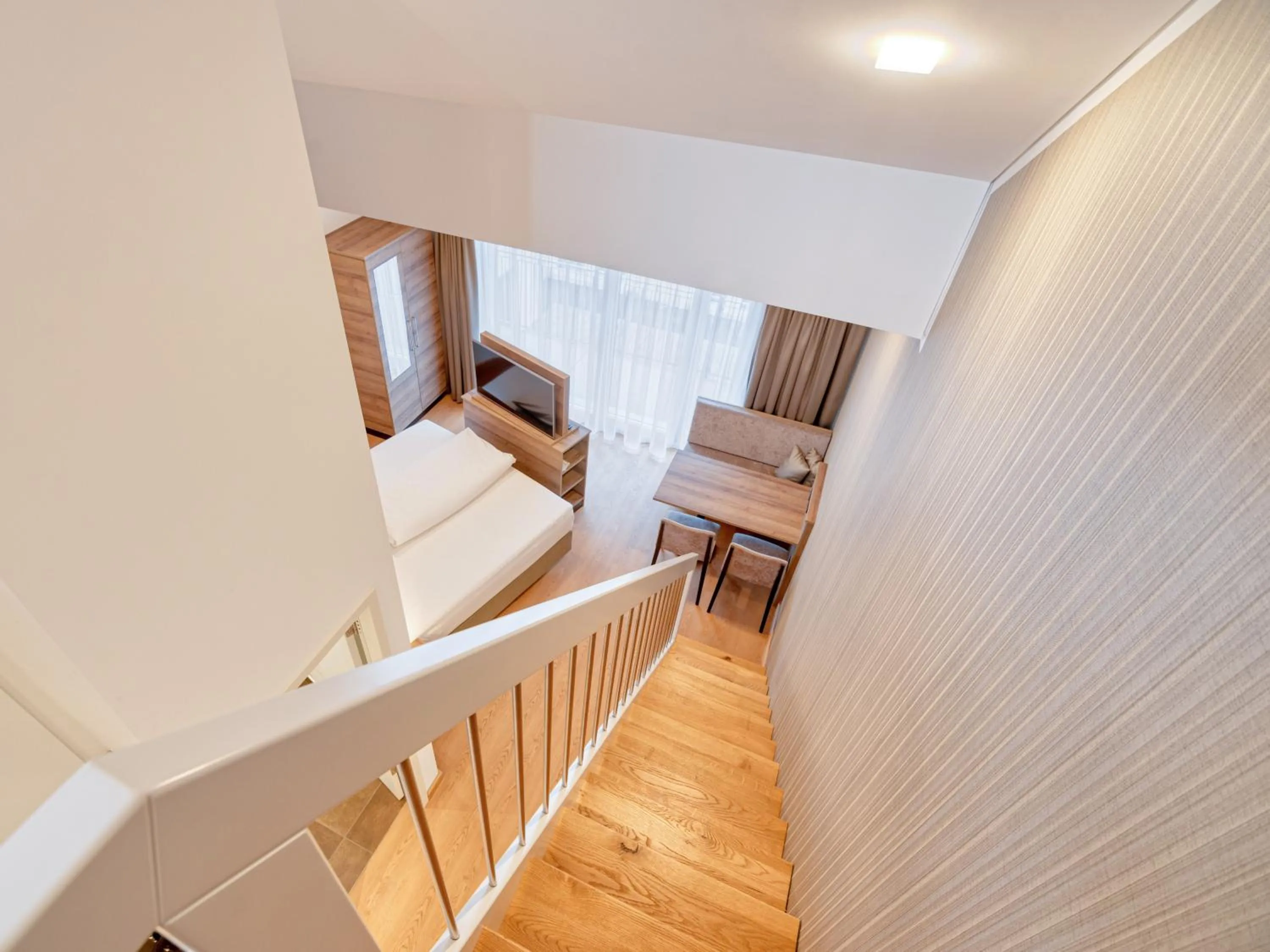 Balcony/Terrace, Bed in WESTSIDE Hotel