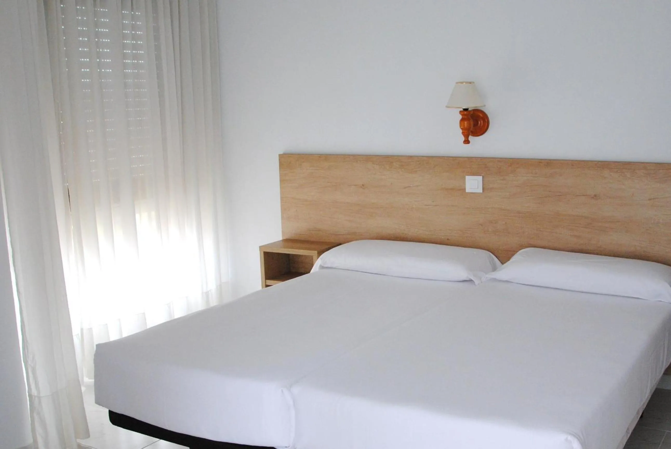 Bedroom in Apartamentos Regollera