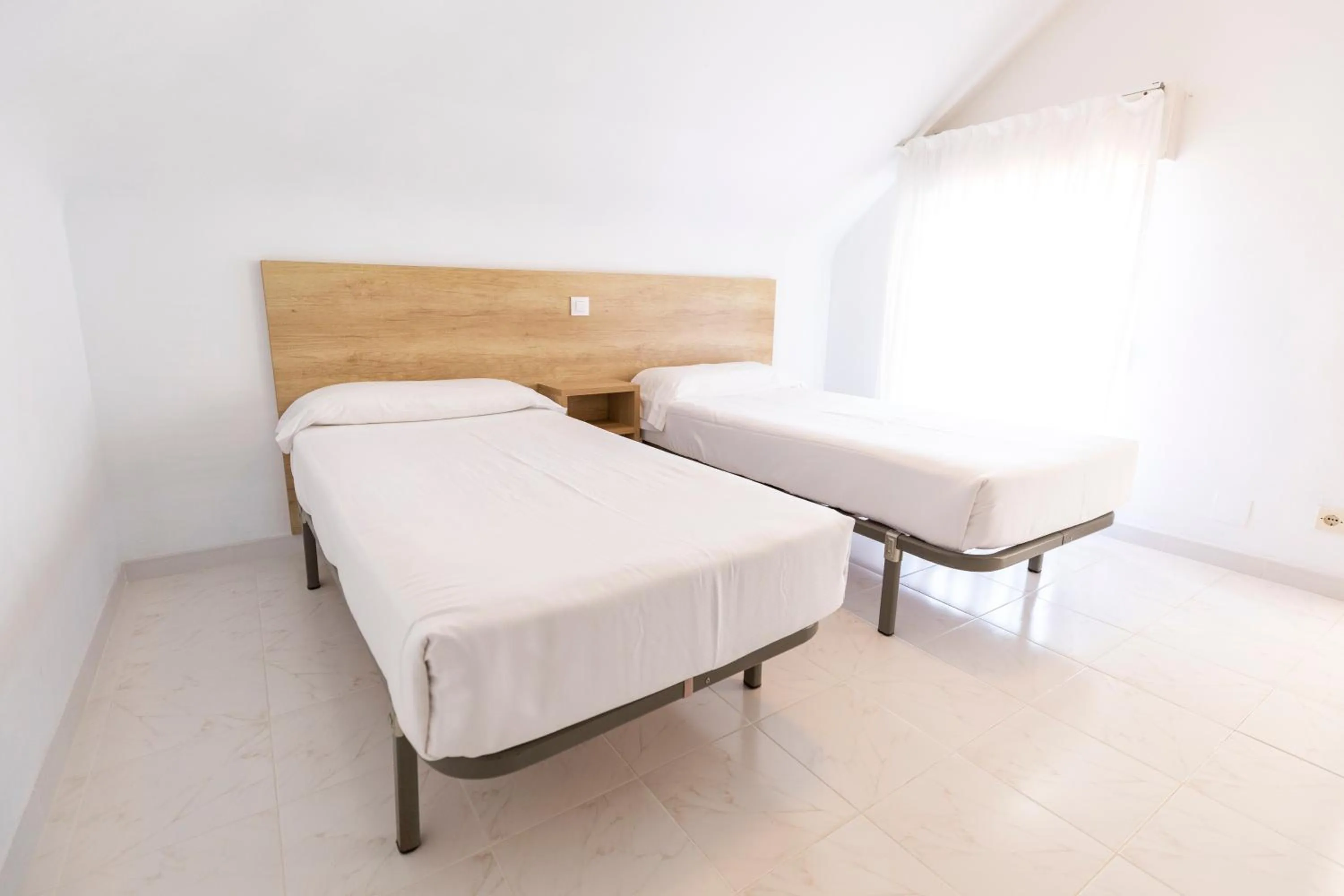 Bedroom in Apartamentos Regollera