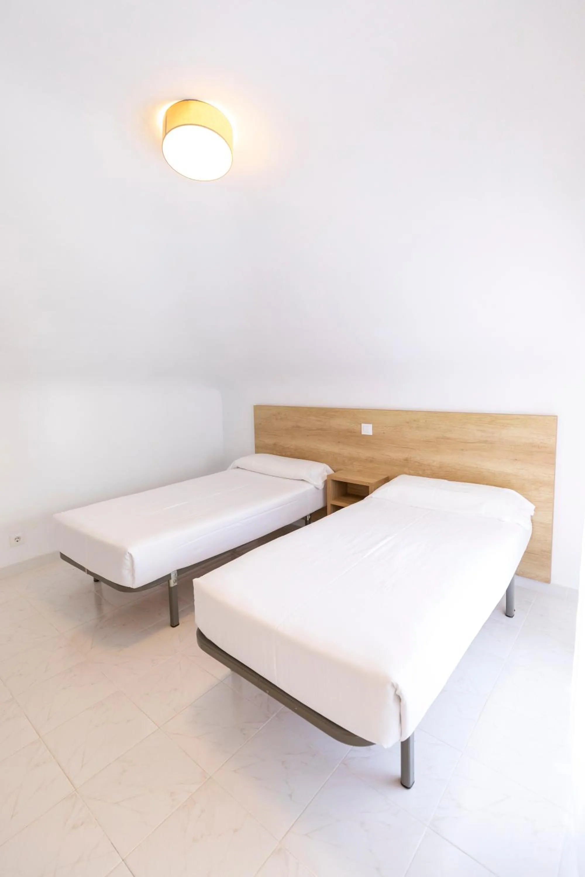 Bed in Apartamentos Regollera