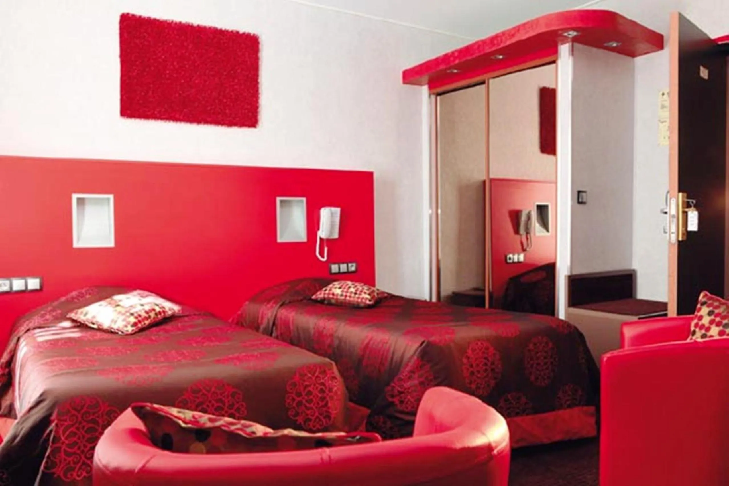 Bed in Grand Hôtel de Valenciennes