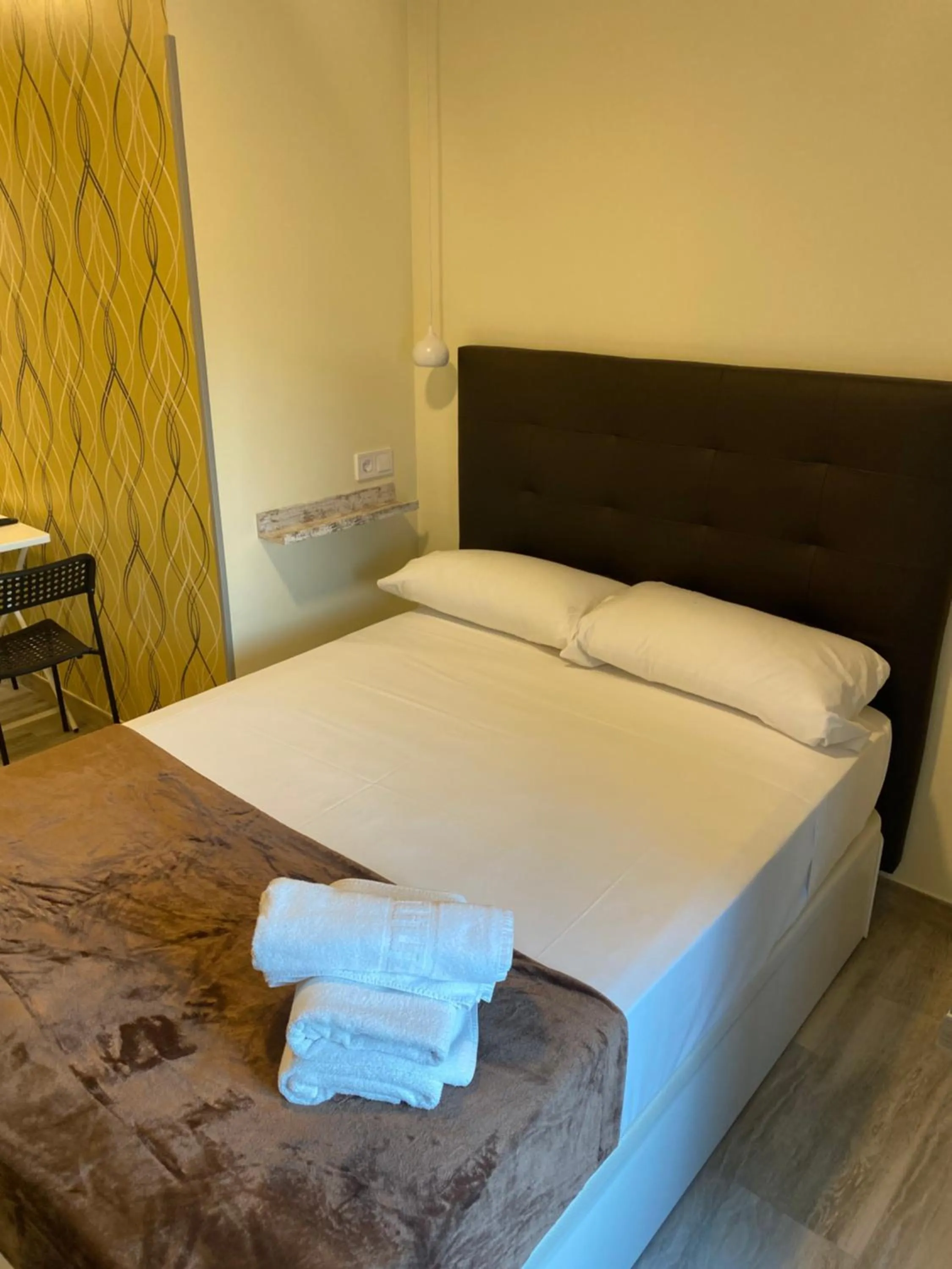 Bed in Hostal Alaska