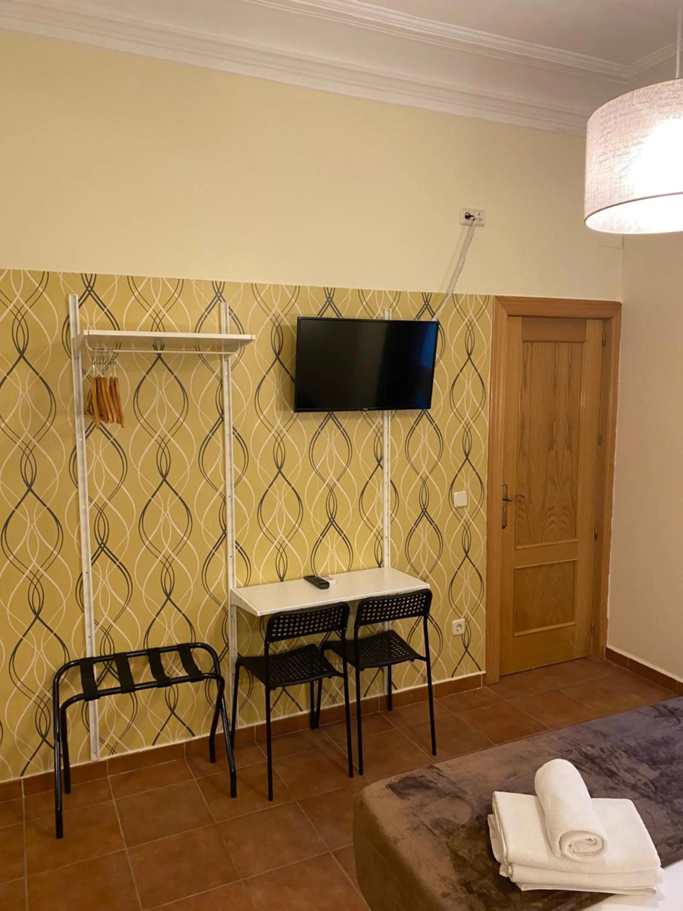 Bed in Hostal Alaska