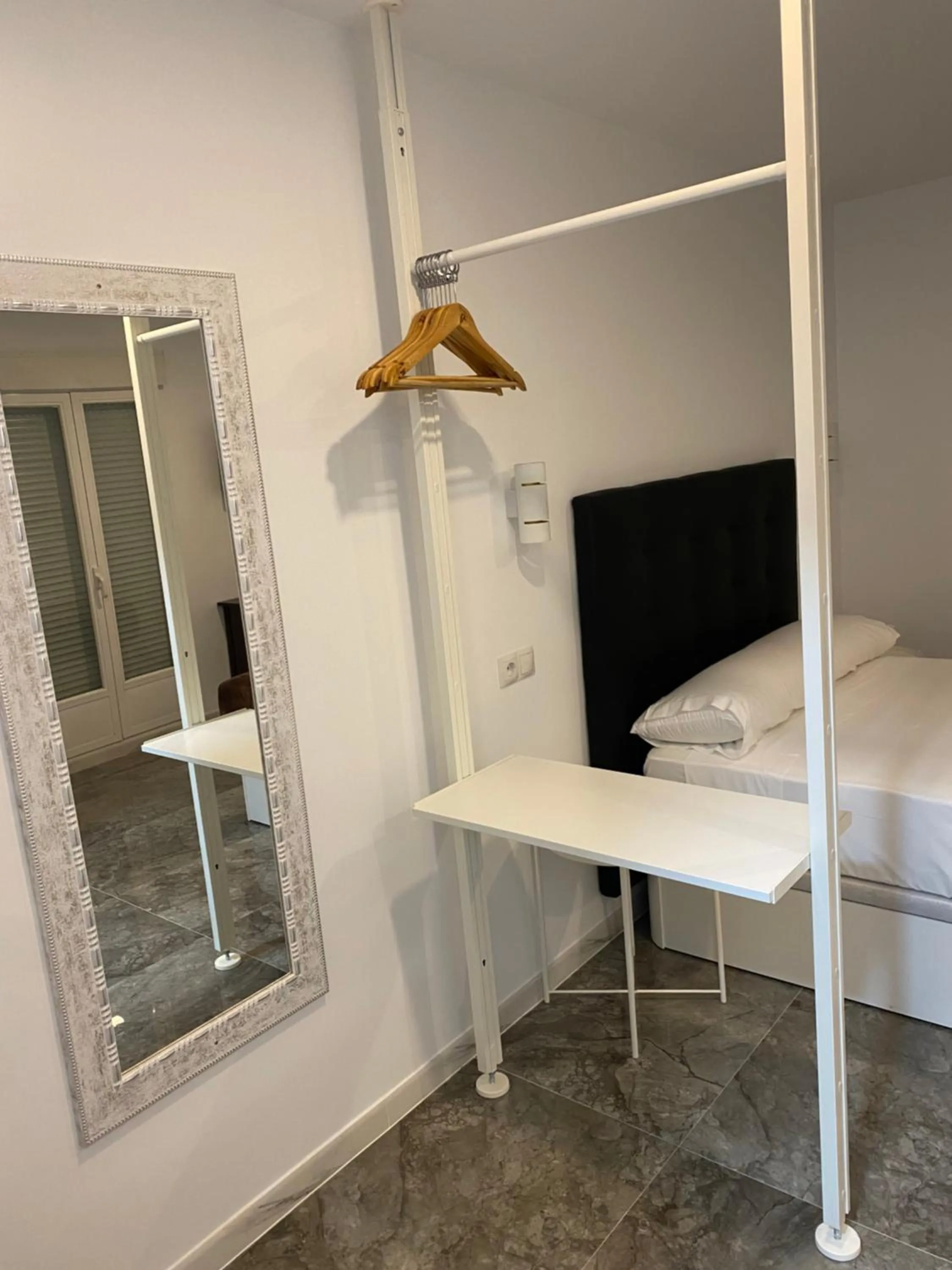 Bed in Hostal Alaska