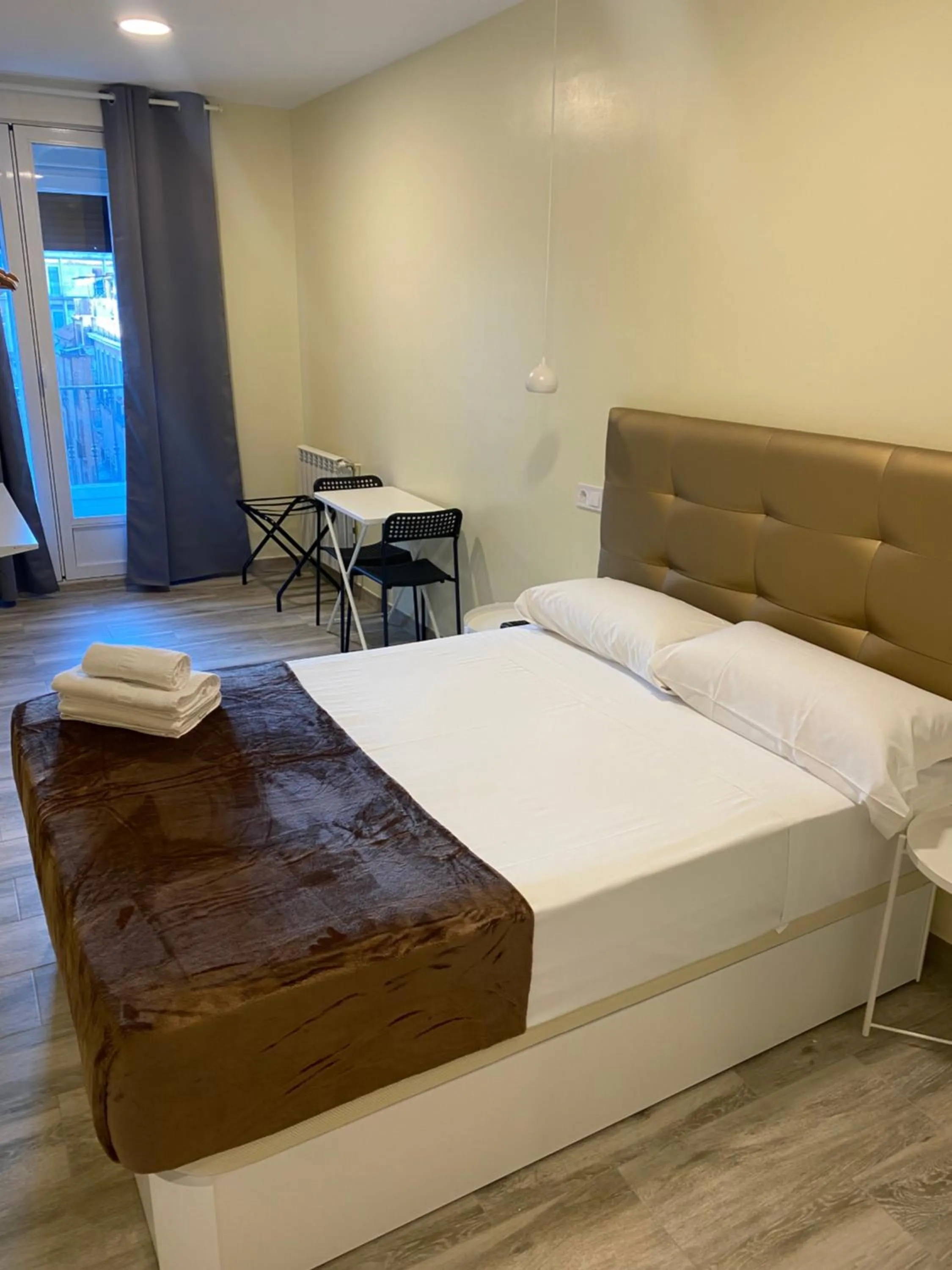 Bed in Hostal Alaska