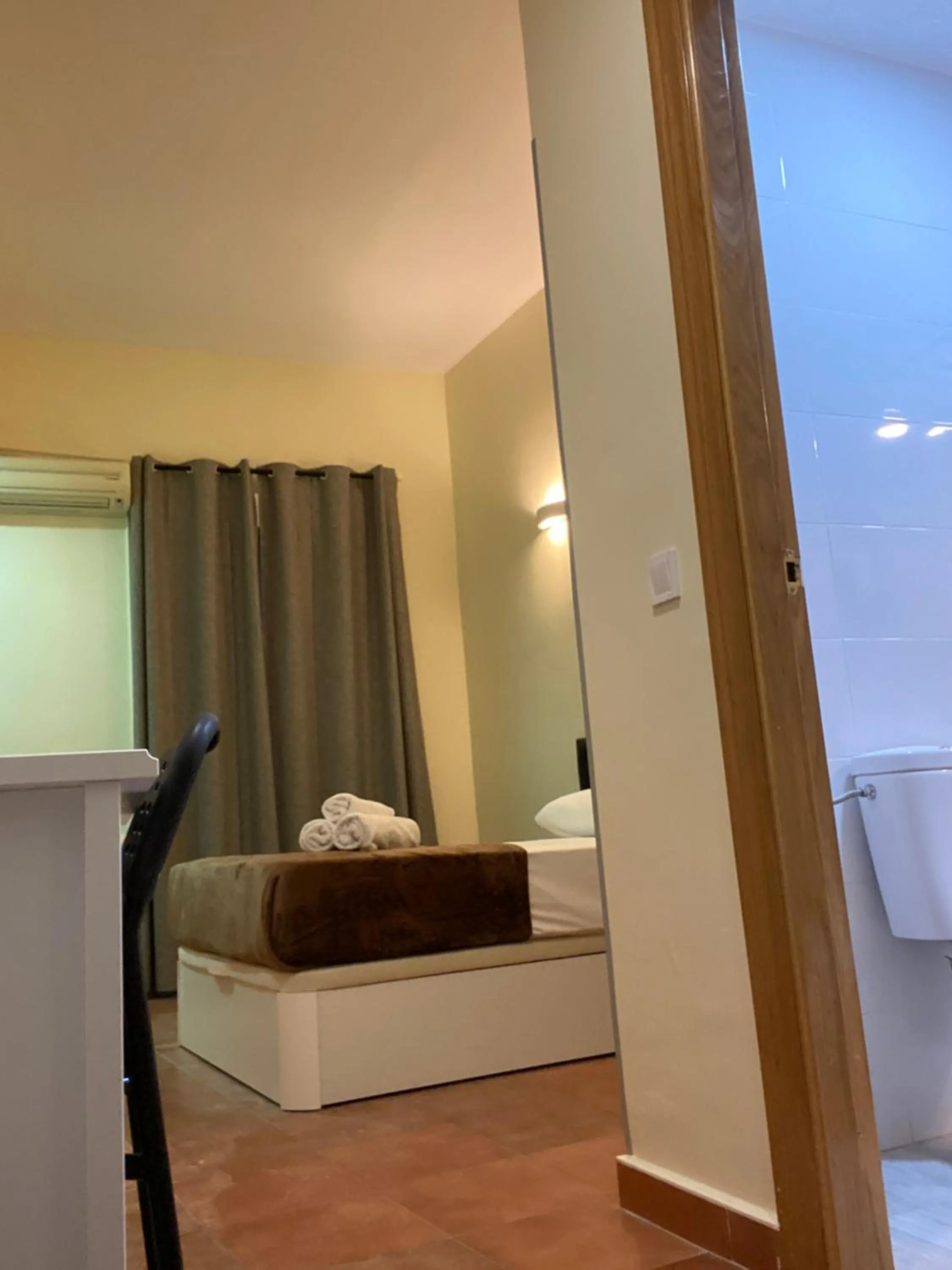 Bed in Hostal Alaska