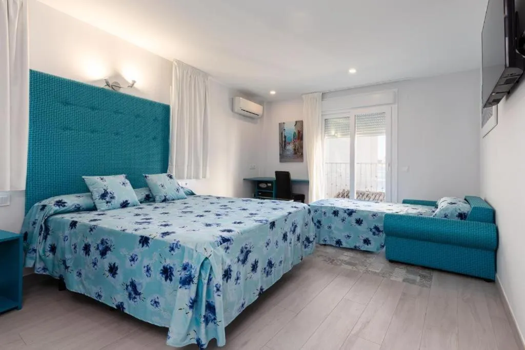 Bed in Hotel Clopy Rocamar