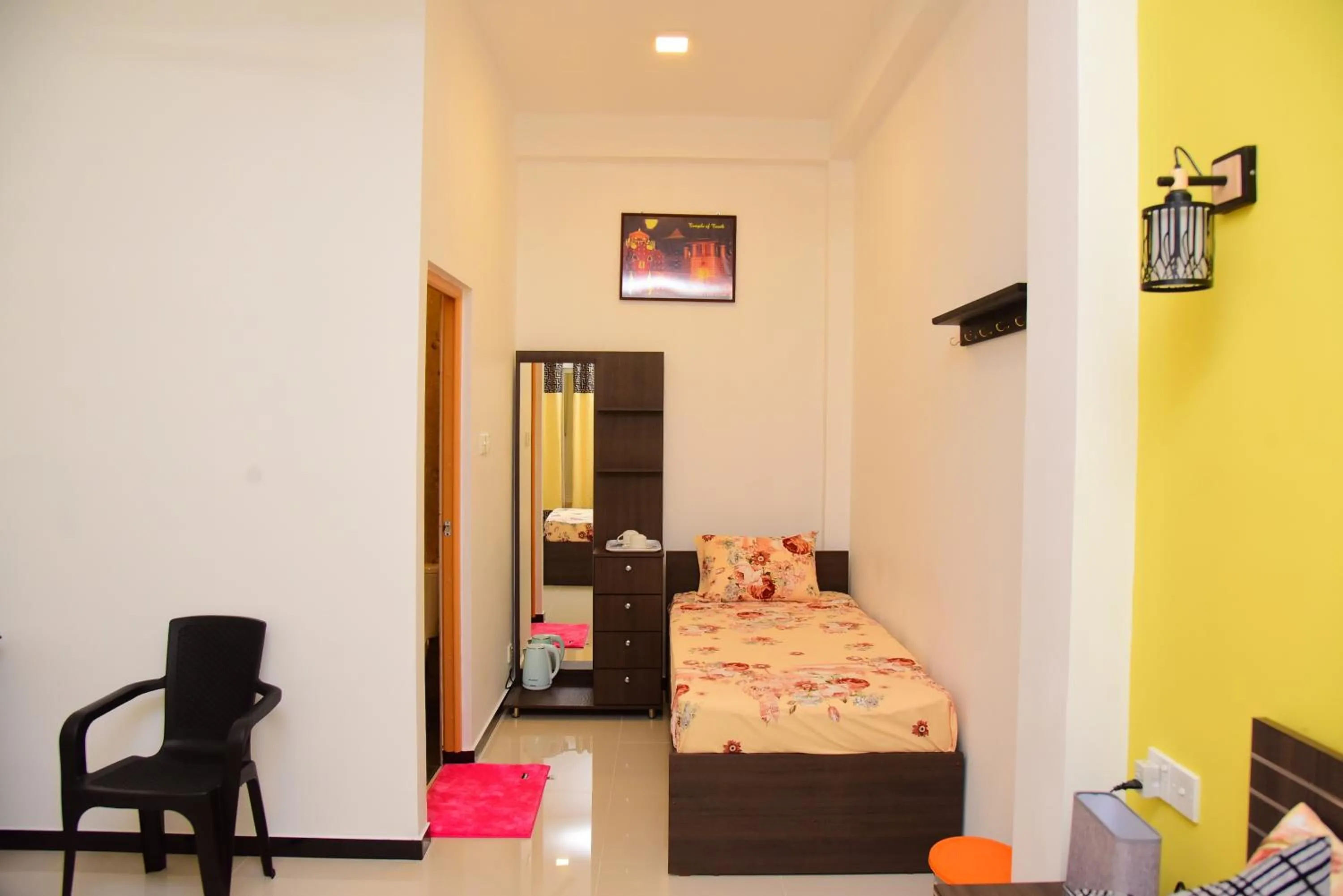 Bed in White Villa Airport Transit Hotel