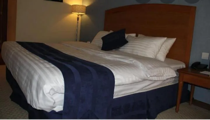 Bed in Reef Al Malaz International Hotel by Al Azmy