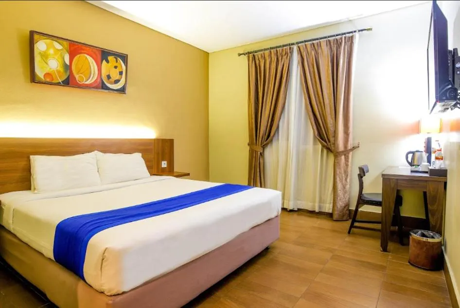 Bed in Dafam Hotel Cilacap