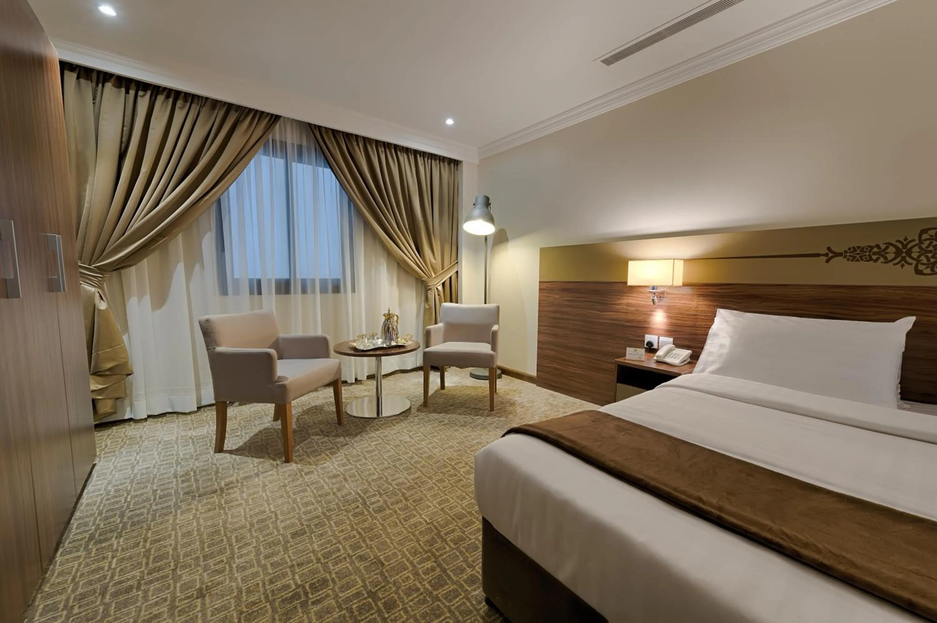 Bedroom in Snaf Inn ِAzizia Hotel