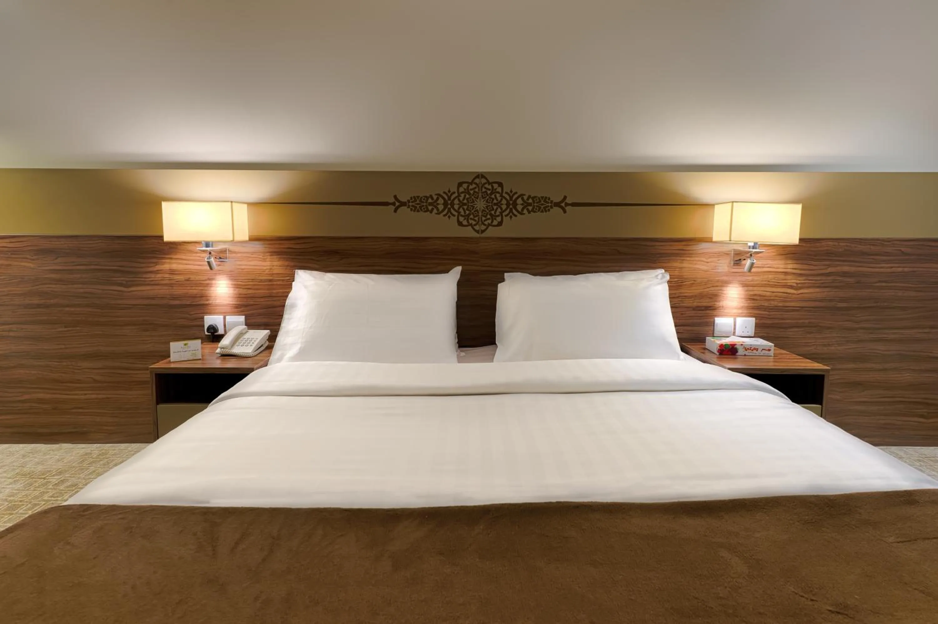 Bedroom in Snaf Inn ِAzizia Hotel