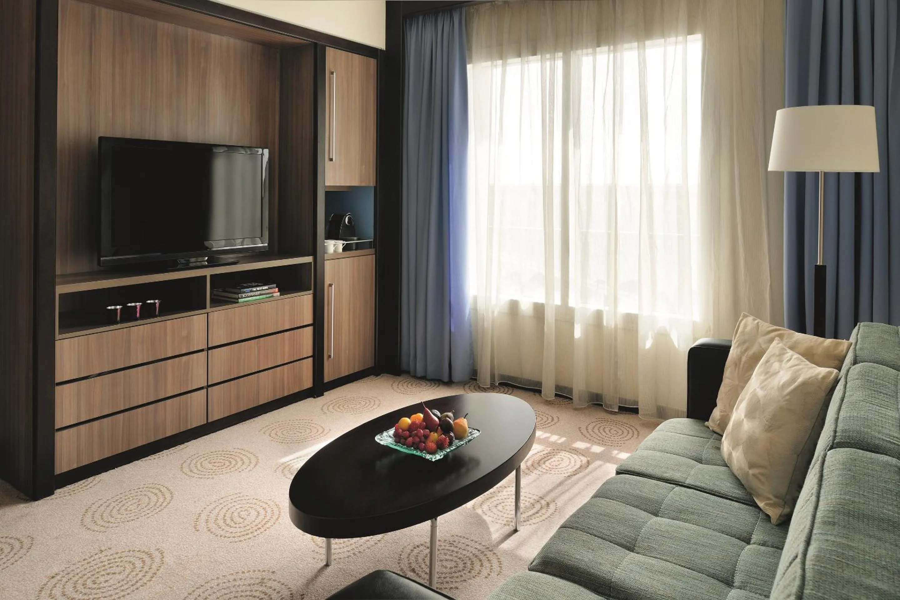 Living room in Avani Deira Dubai Hotel