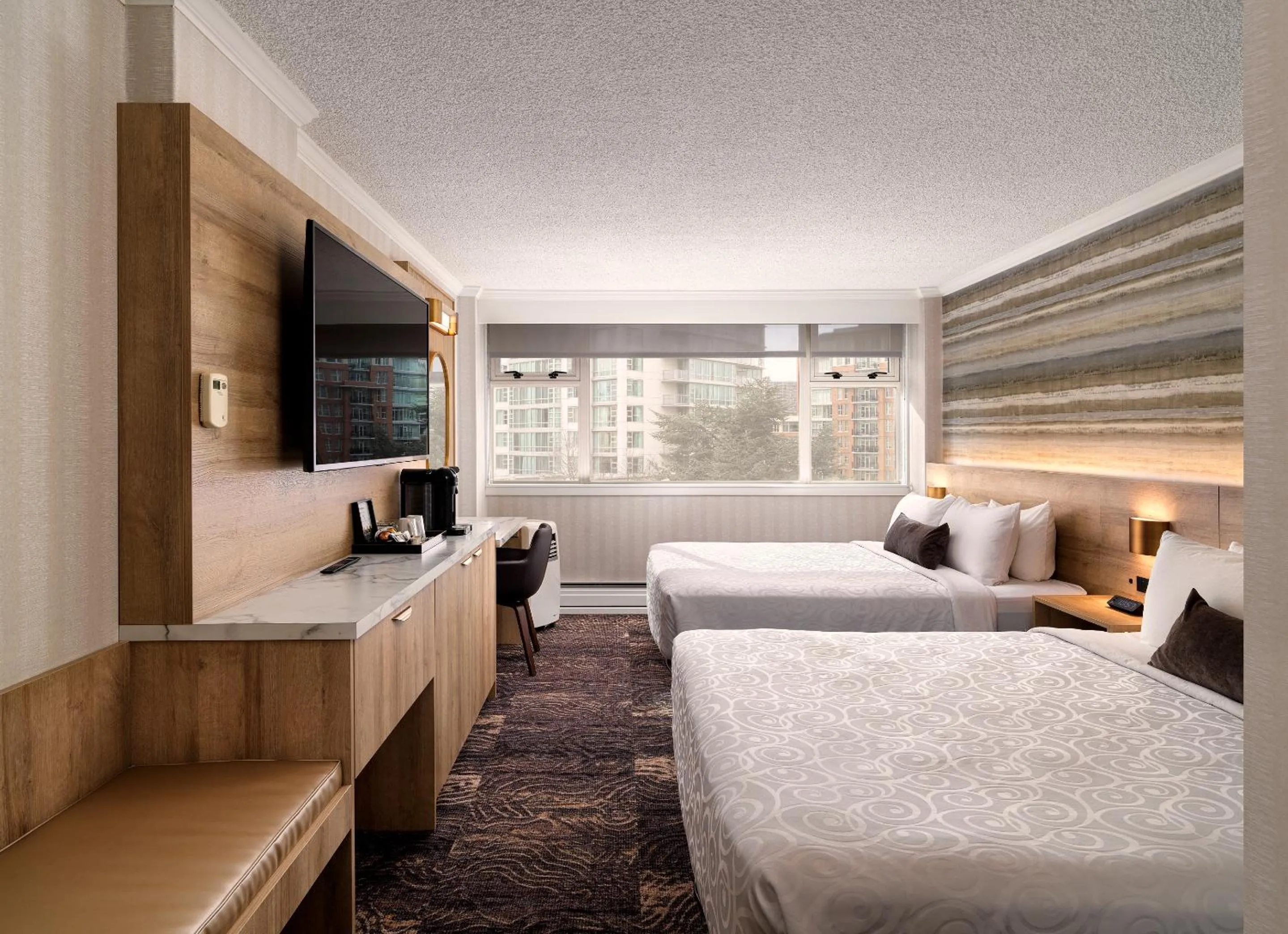 Bed in Chateau Victoria Hotel & Suites