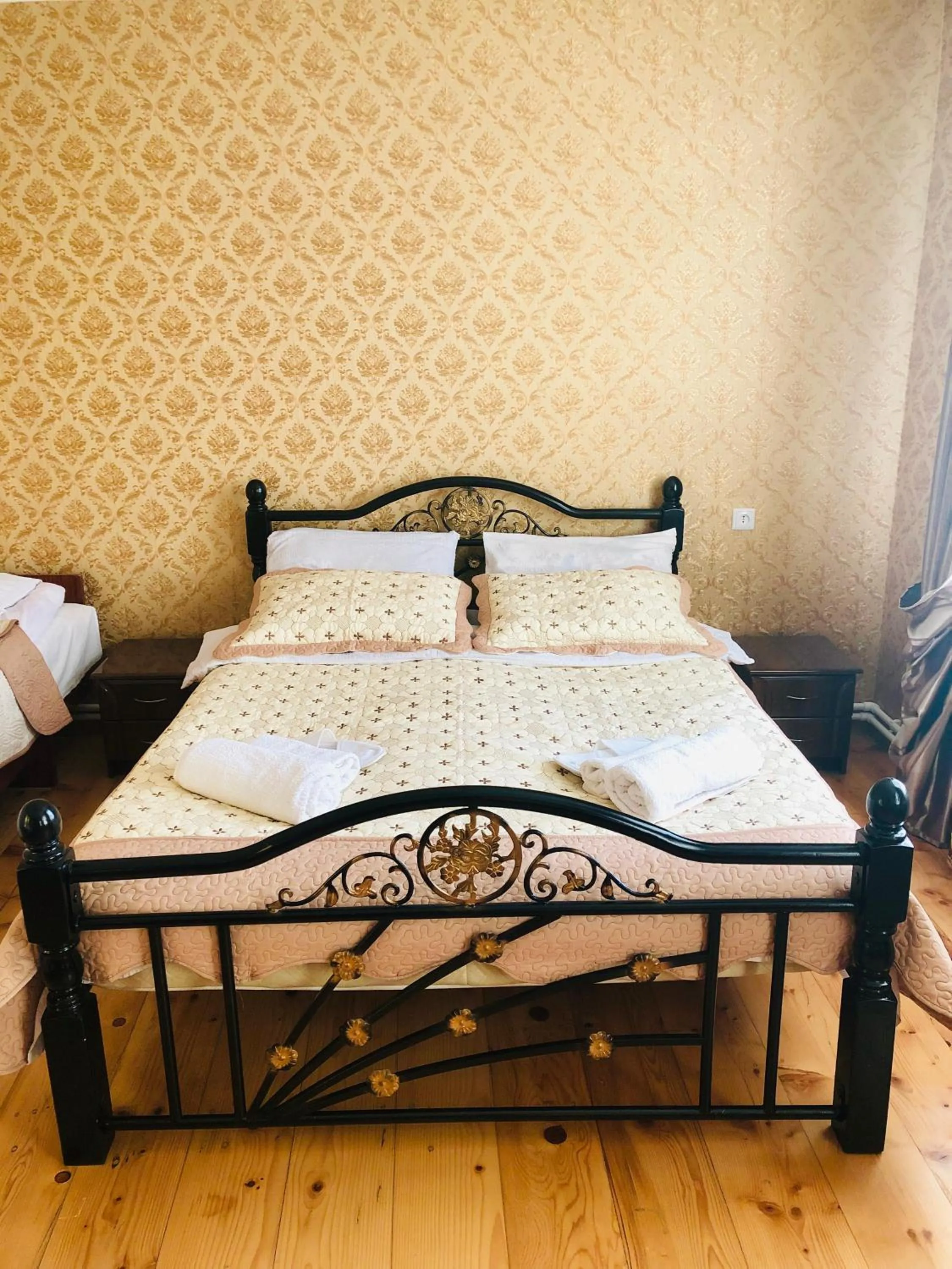 Bed in Guest House Elguja Qushashvili