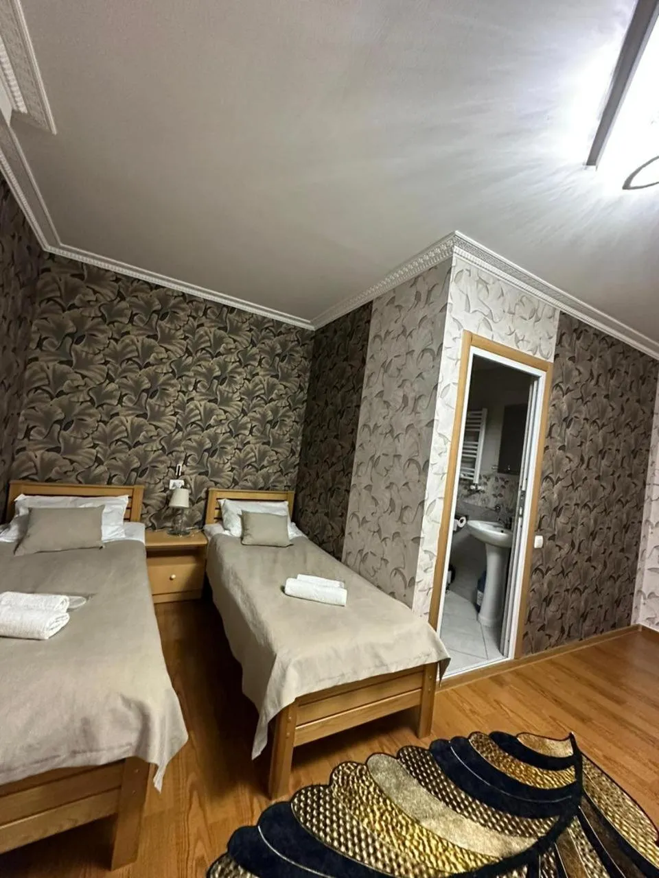 Bed in Guest House Elguja Qushashvili