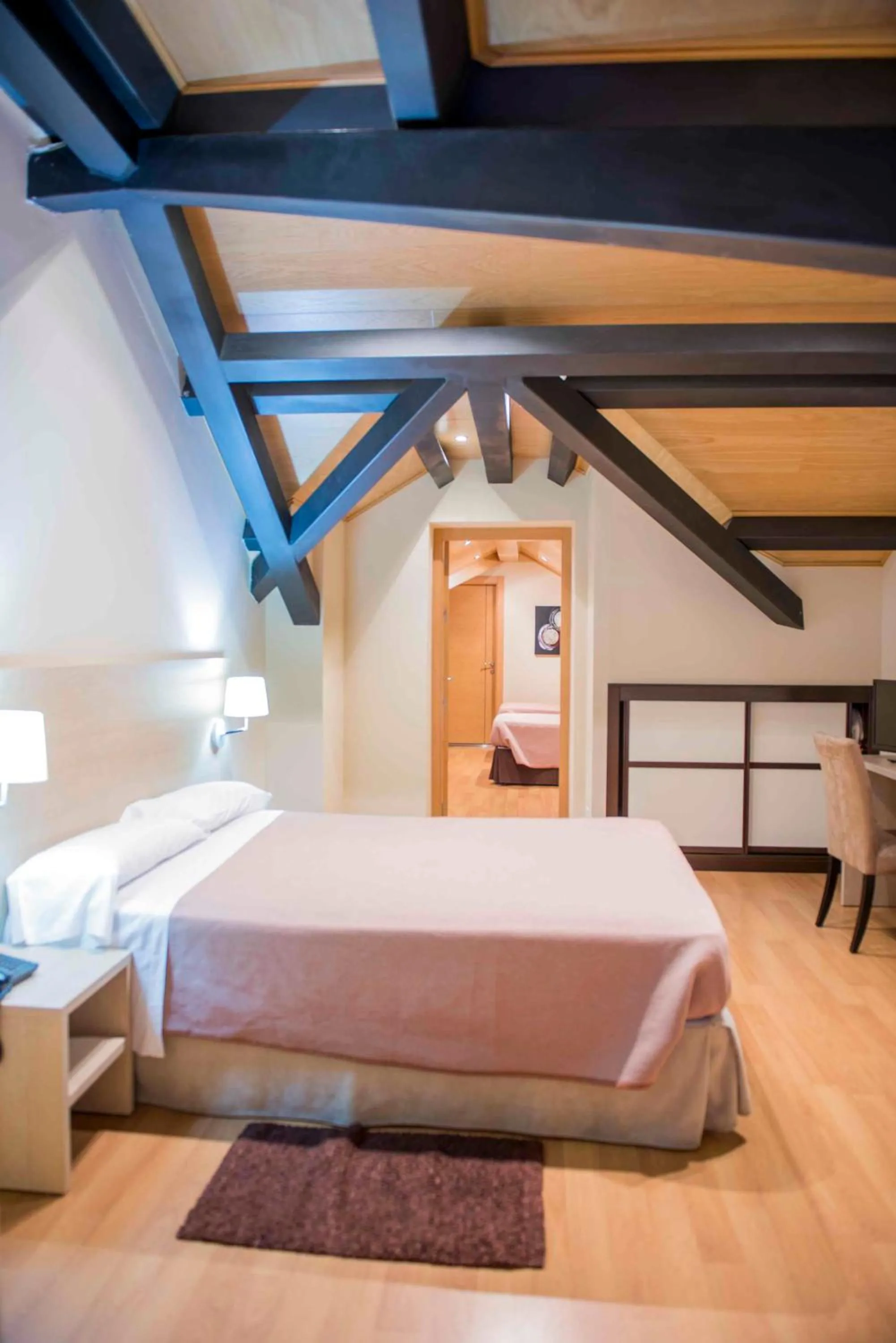 Bed in Hotel Meson de Erosa