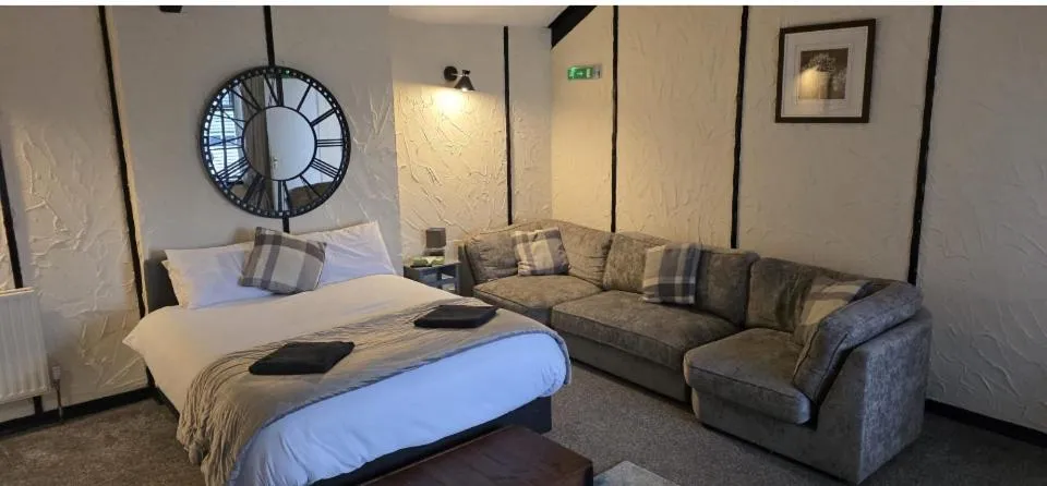 Bed in The Coach House at The Bull Inn