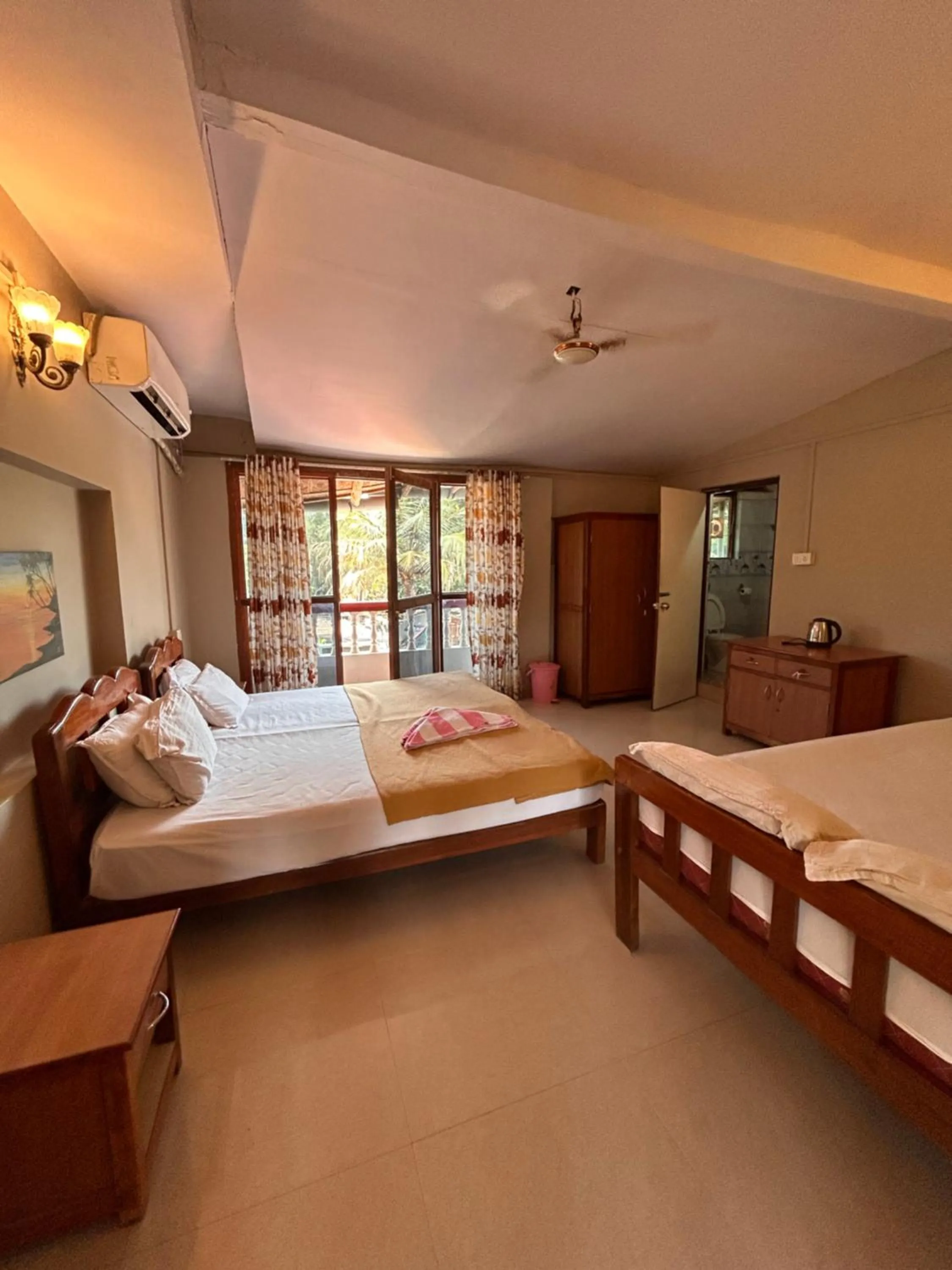 Bed in Maria Paulo Guest House Bar and Restaurant